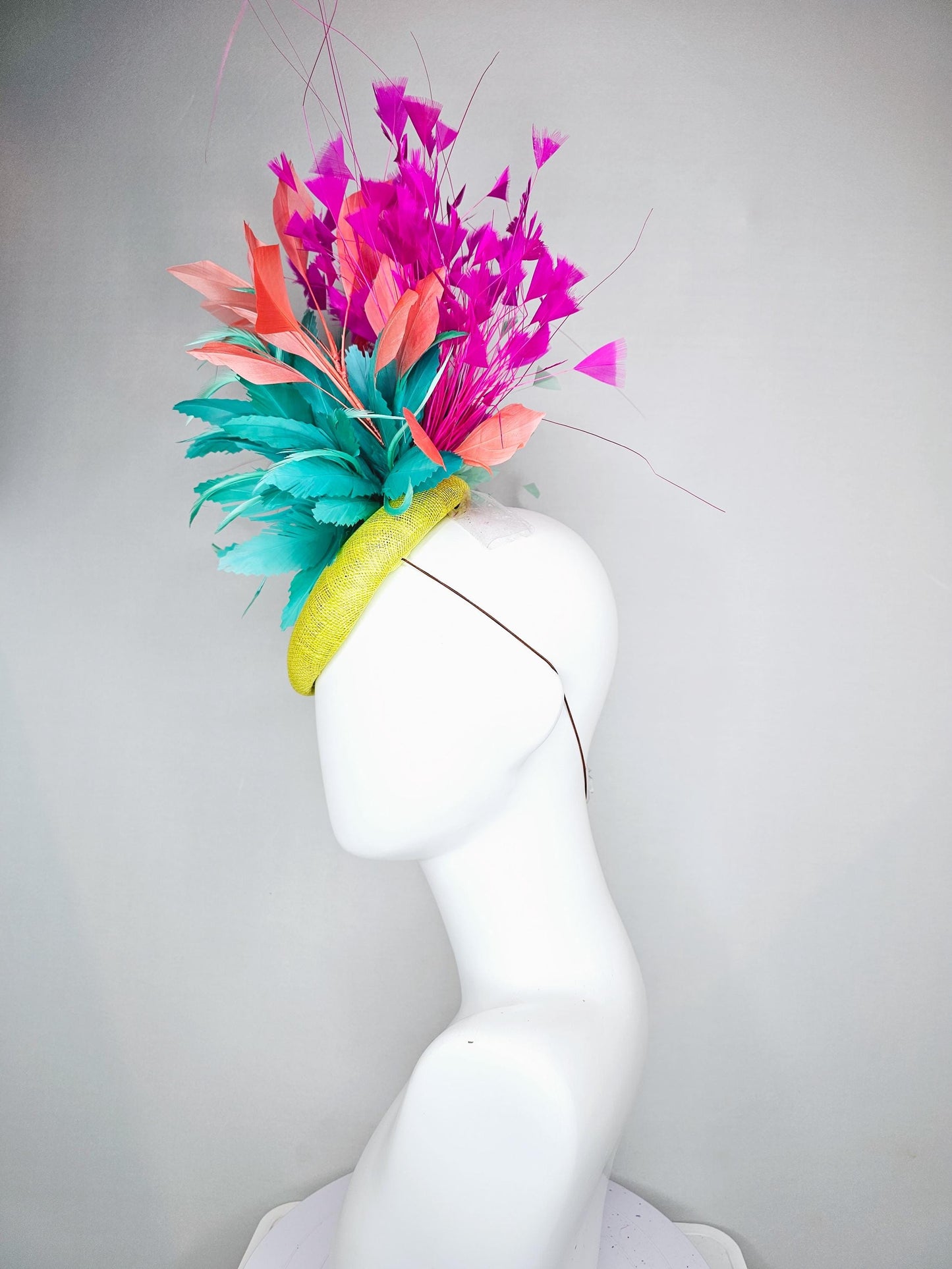 kentucky derby hat fascinator yellow sinamay with large fluffy aqua blue light orange coral feather flowers, bright pink branching feathers
