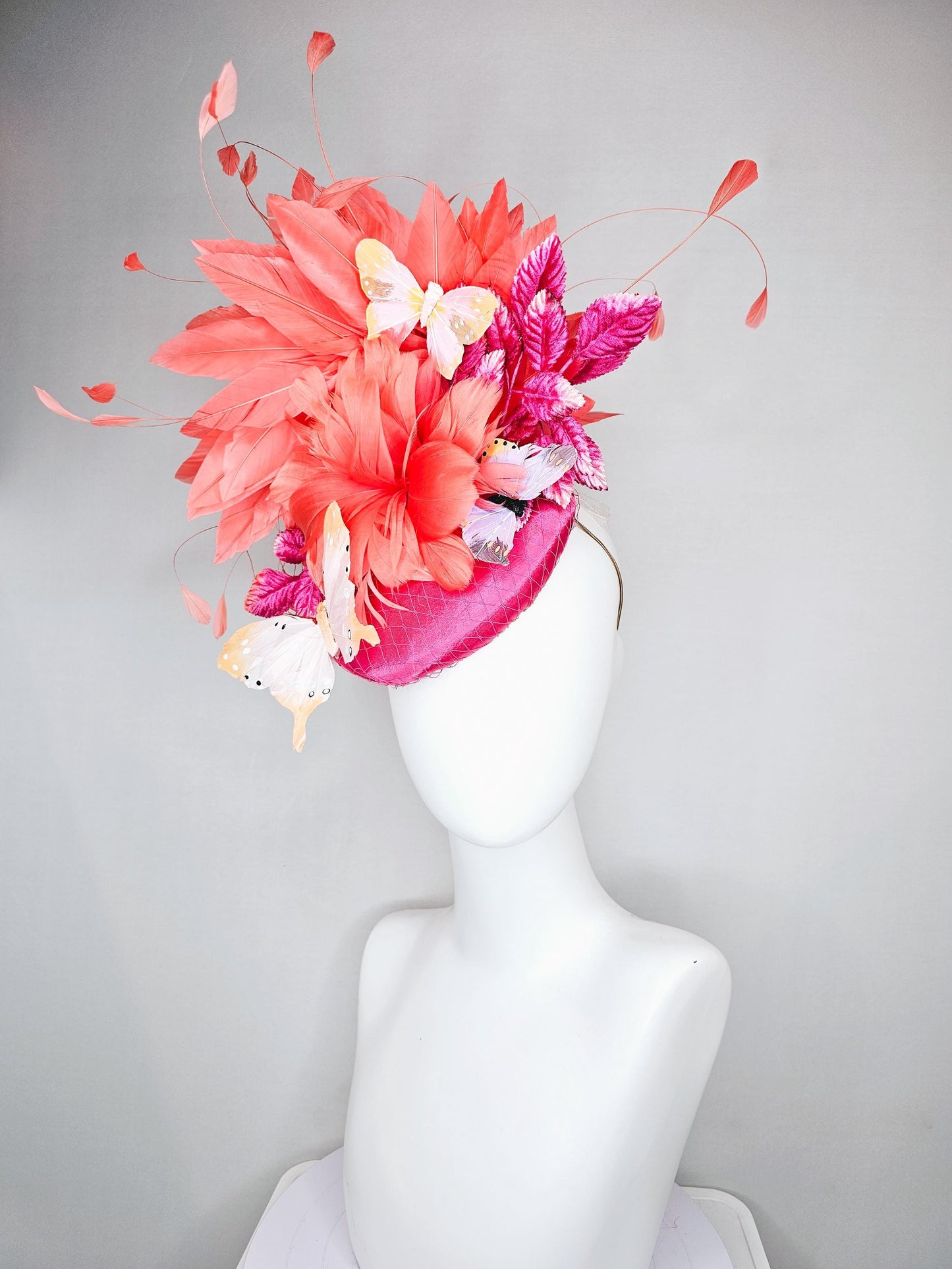 kentucky derby hat fascinator pink satin with netting,orange coral feather flower,pink leaves,orange branching feathers,white butterflies