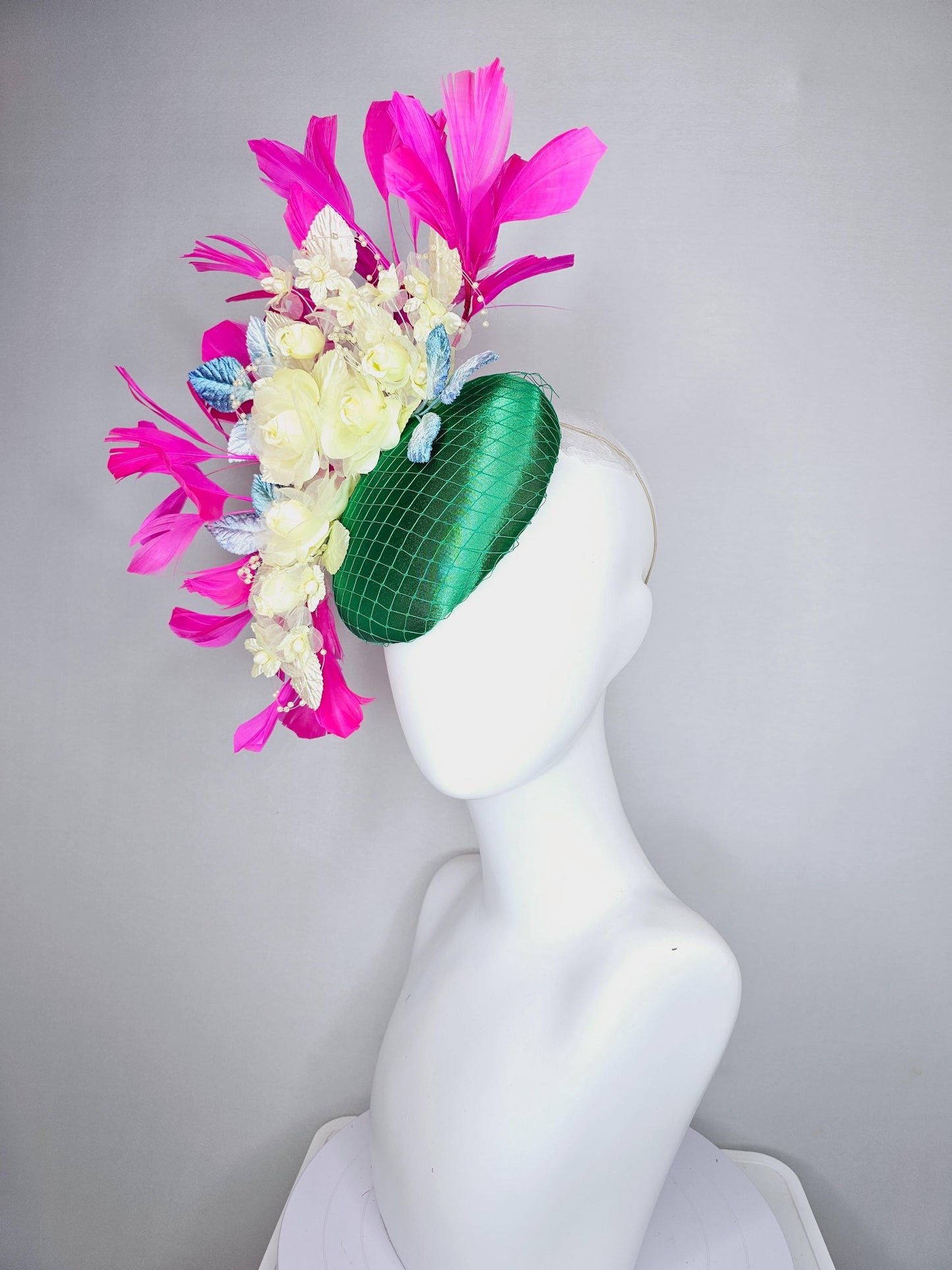 kentucky derby hat fascinator emerald green satin with netting, light yellow organza satin flowers, ombre blue leaves, pink fuchsia feathers
