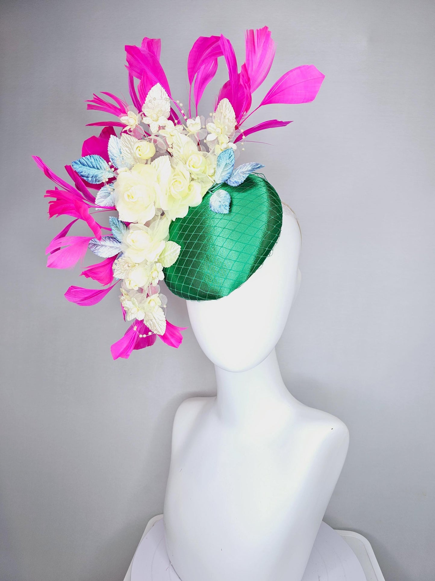 kentucky derby hat fascinator emerald green satin with netting, light yellow organza satin flowers, ombre blue leaves, pink fuchsia feathers