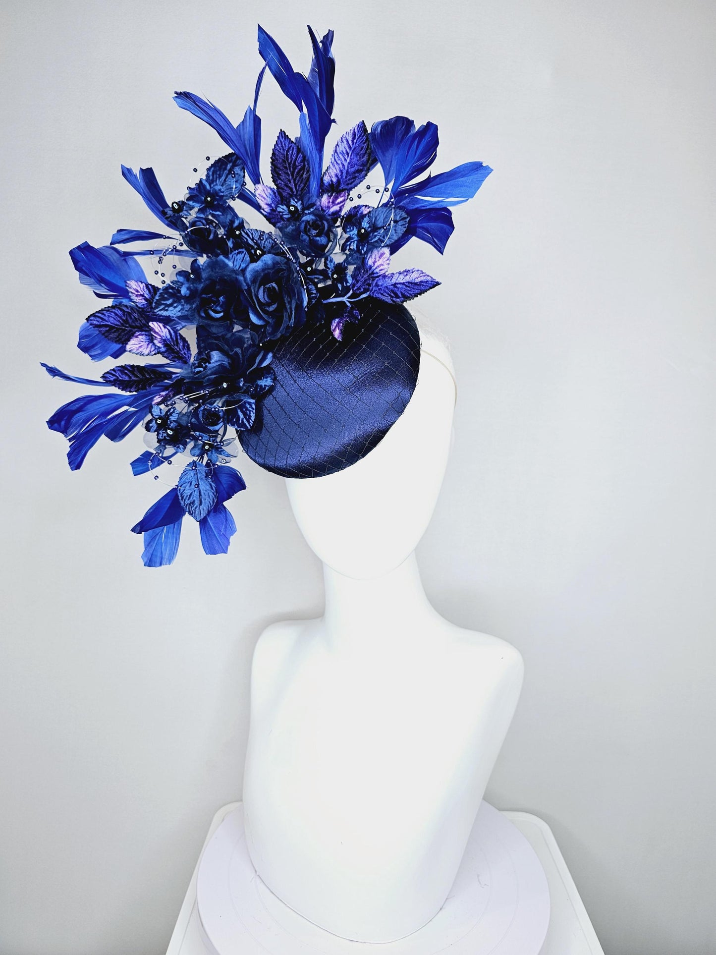 kentucky derby hat fascinator navy blue satin with netting navy blue organza satin flowers royal blue purple leaves royal blue feathers