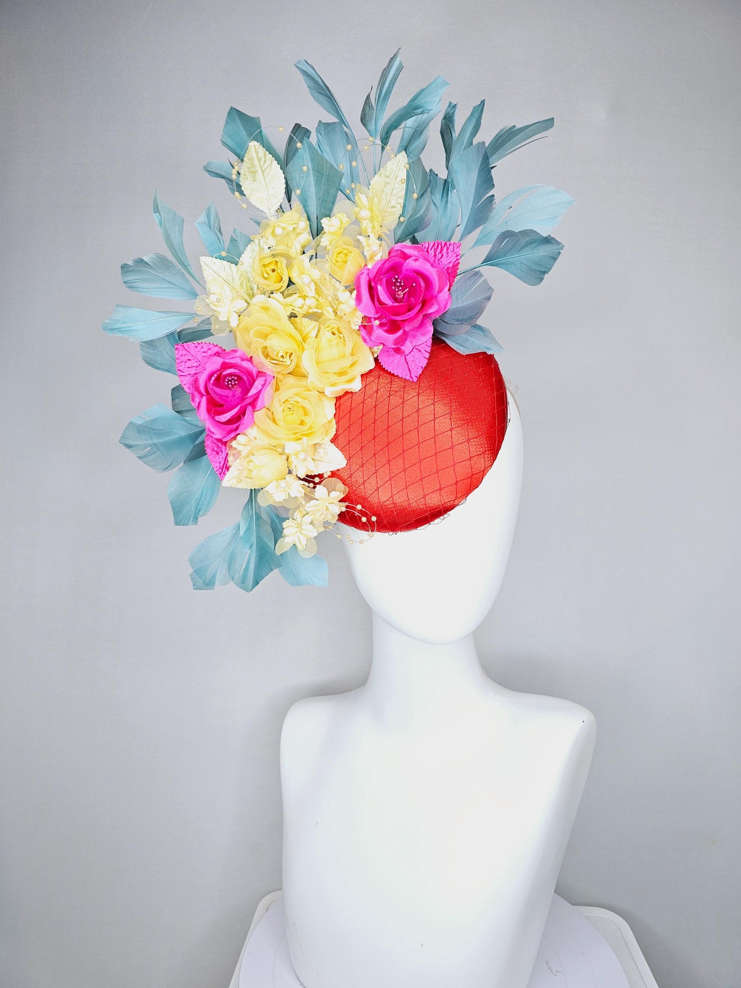 kentucky derby hat fascinator red satin with netting, pink yellow organza satin rose flowers,pink yellow leaves,teal blue branching feathers