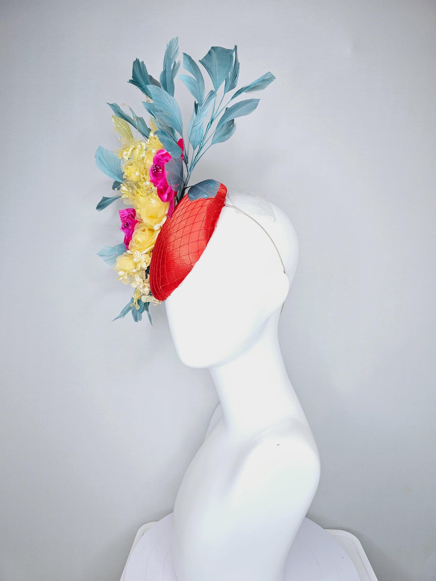 kentucky derby hat fascinator red satin with netting, pink yellow organza satin rose flowers,pink yellow leaves,teal blue branching feathers