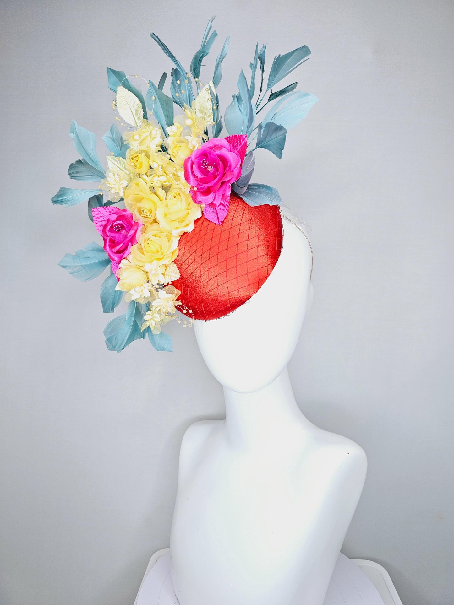 kentucky derby hat fascinator red satin with netting, pink yellow organza satin rose flowers,pink yellow leaves,teal blue branching feathers