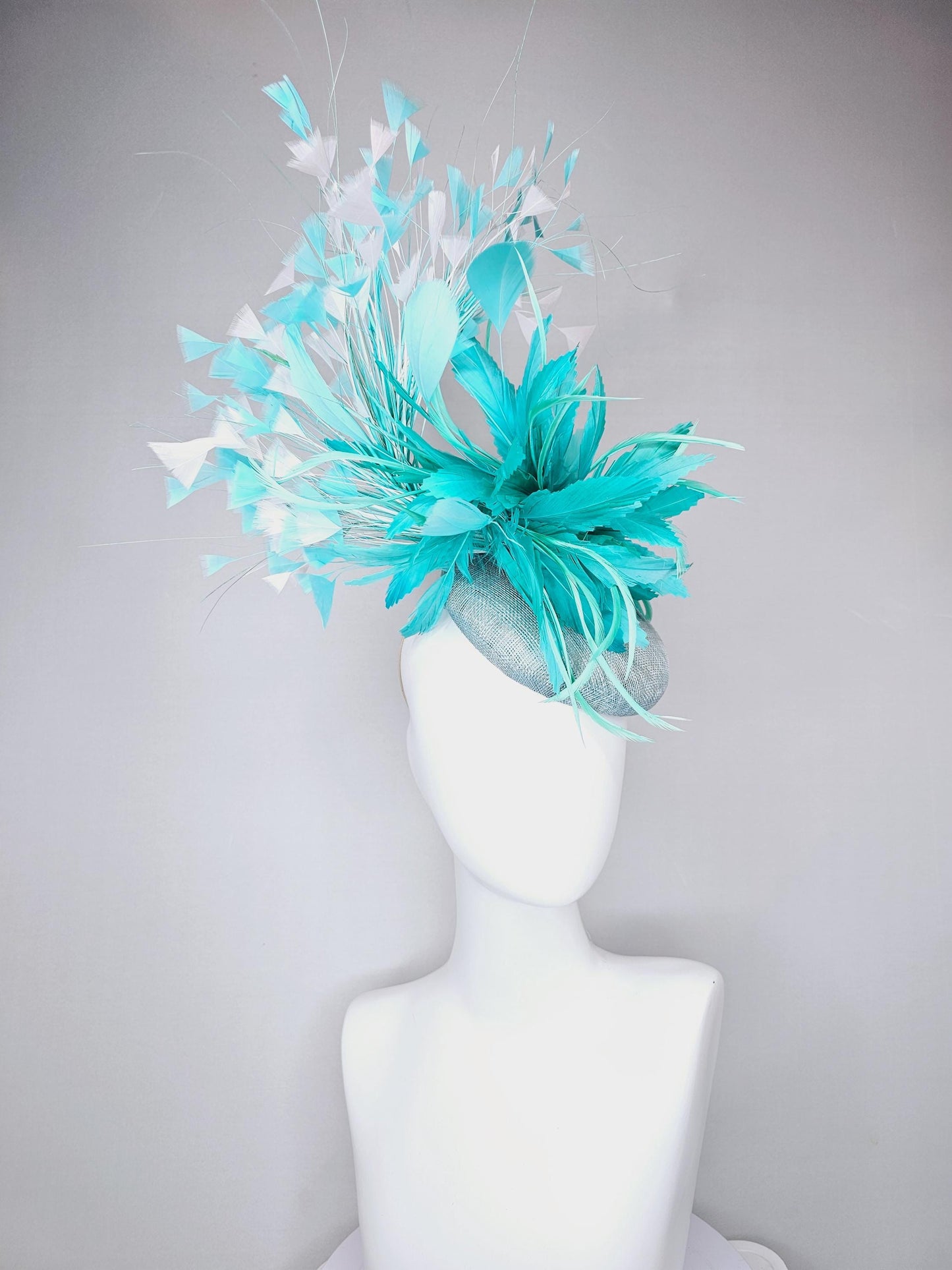 kentucky derby hat fascinator light blue sinamay, fluffy turquoise blue mint green zigzag feather flower, white blue branching feathers