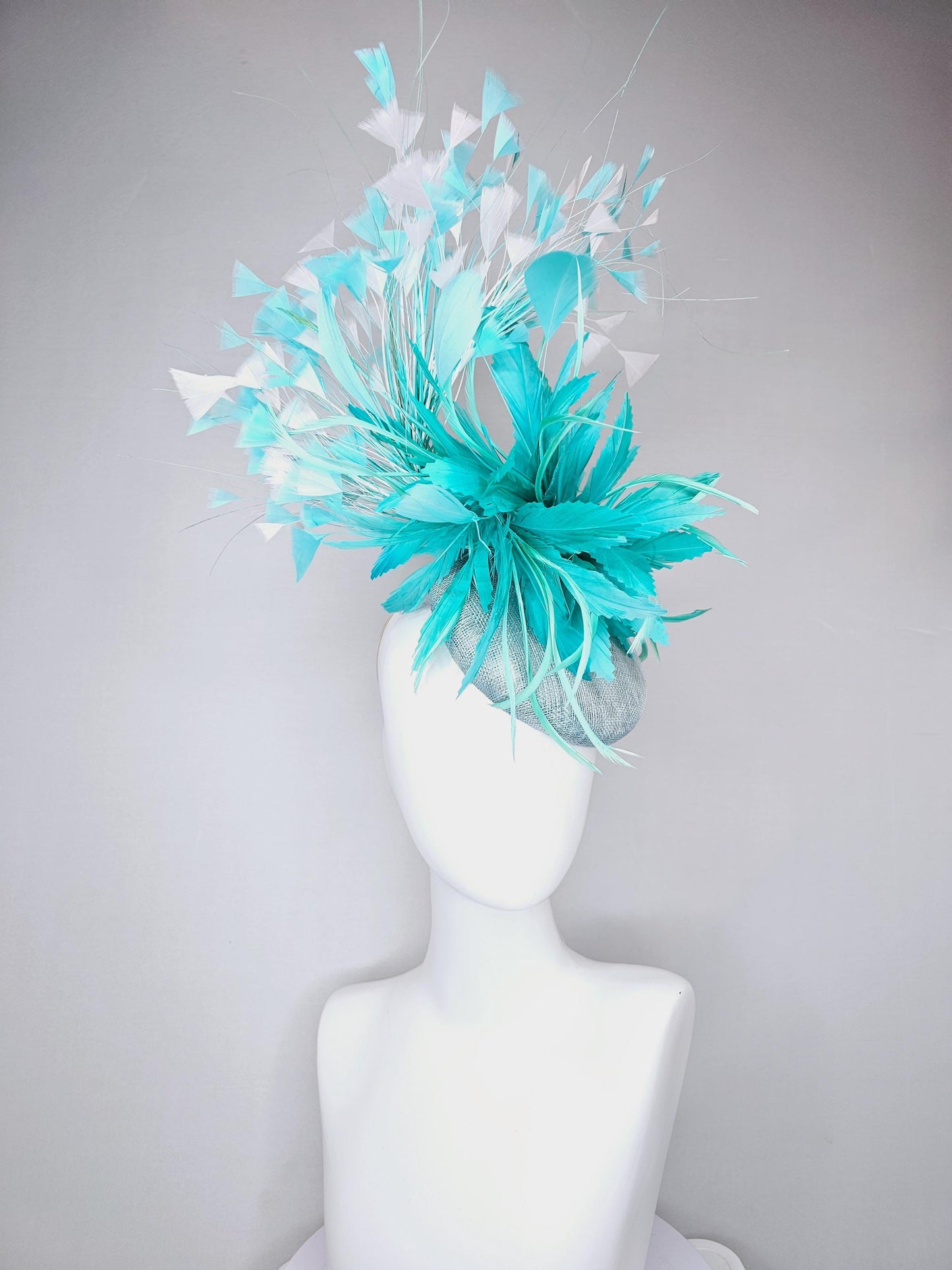 kentucky derby hat fascinator light blue sinamay, fluffy turquoise blue mint green zigzag feather flower, white blue branching feathers