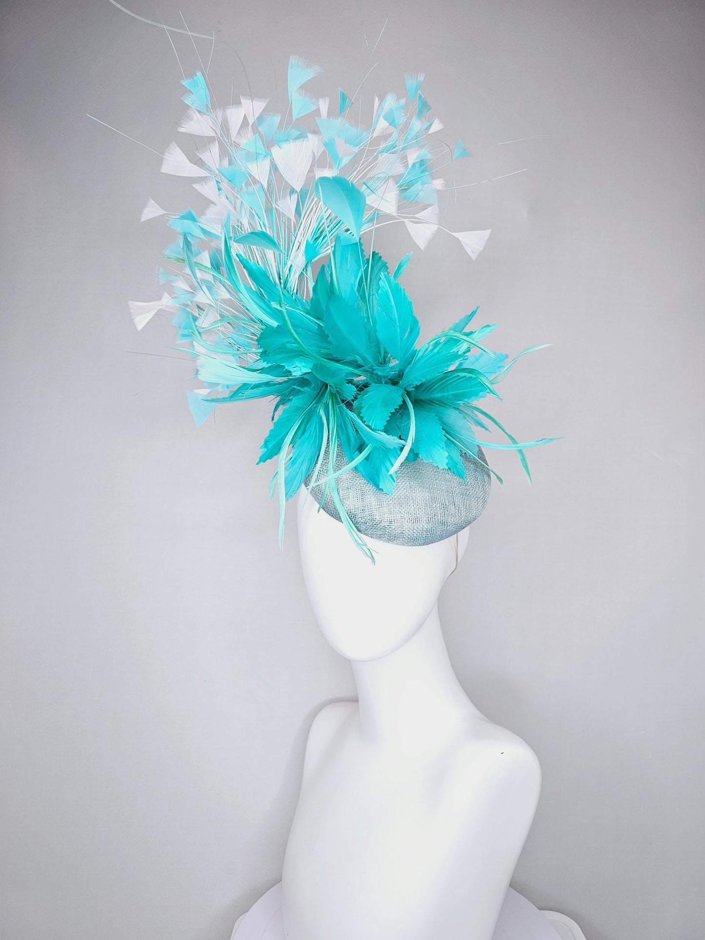 kentucky derby hat fascinator light blue sinamay, fluffy turquoise blue mint green zigzag feather flower, white blue branching feathers