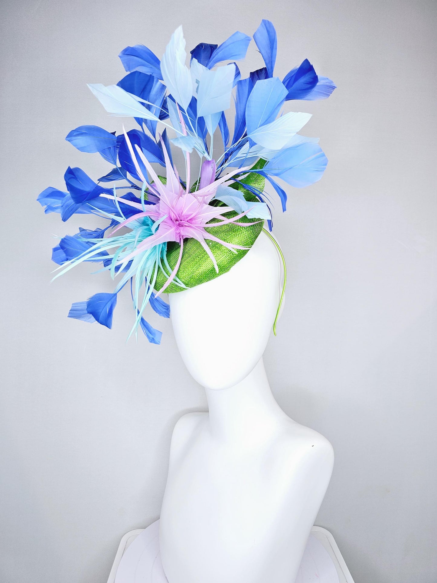 kentucky derby hat fascinator bright green sinamay with curls,lavender purple feather flower and light blue,royal and cobalt blue feathers