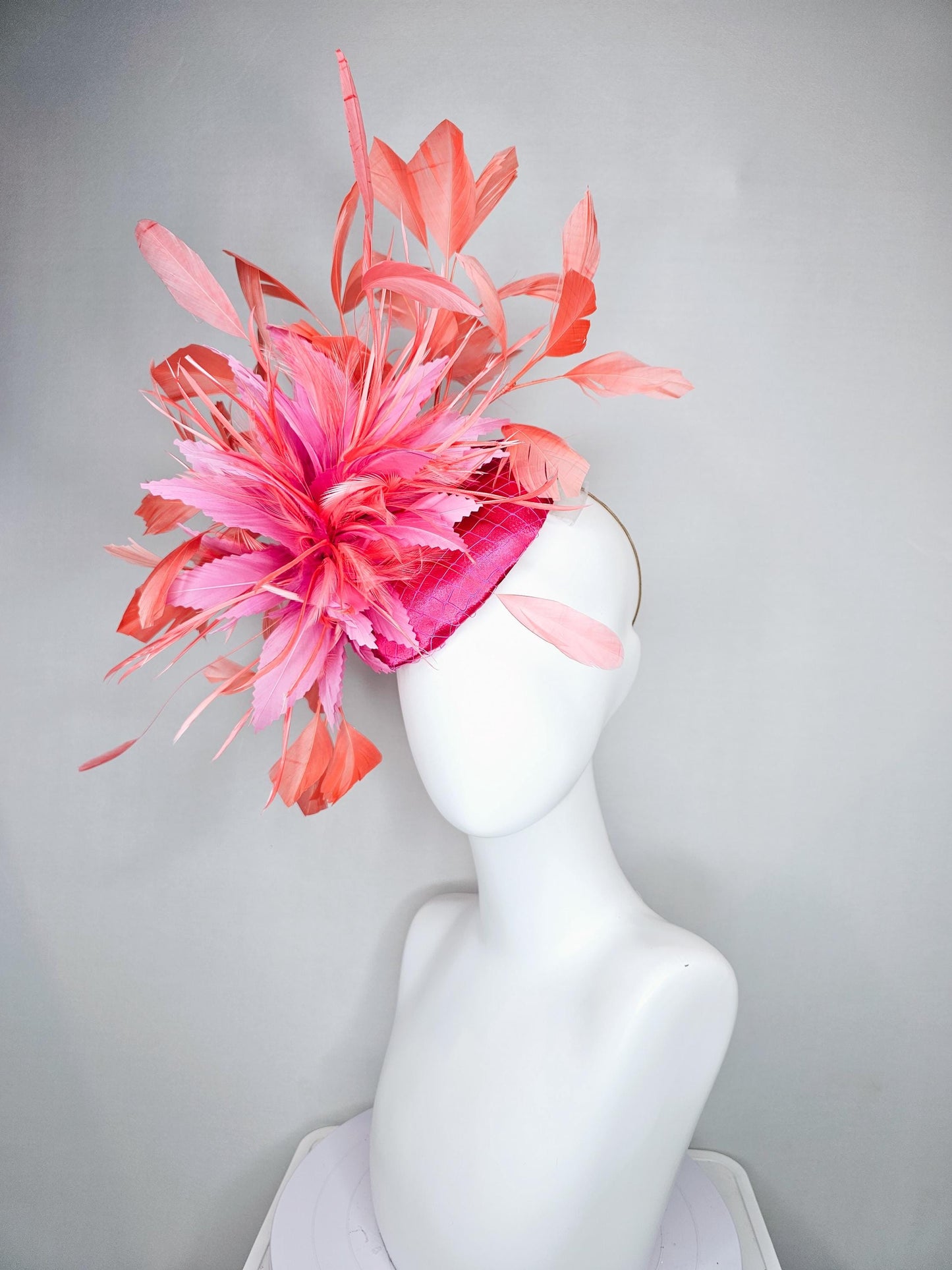 kentucky derby hat fascinator hot pink satin with netting,and light pink feather flowers with coral orange peach branching feathers