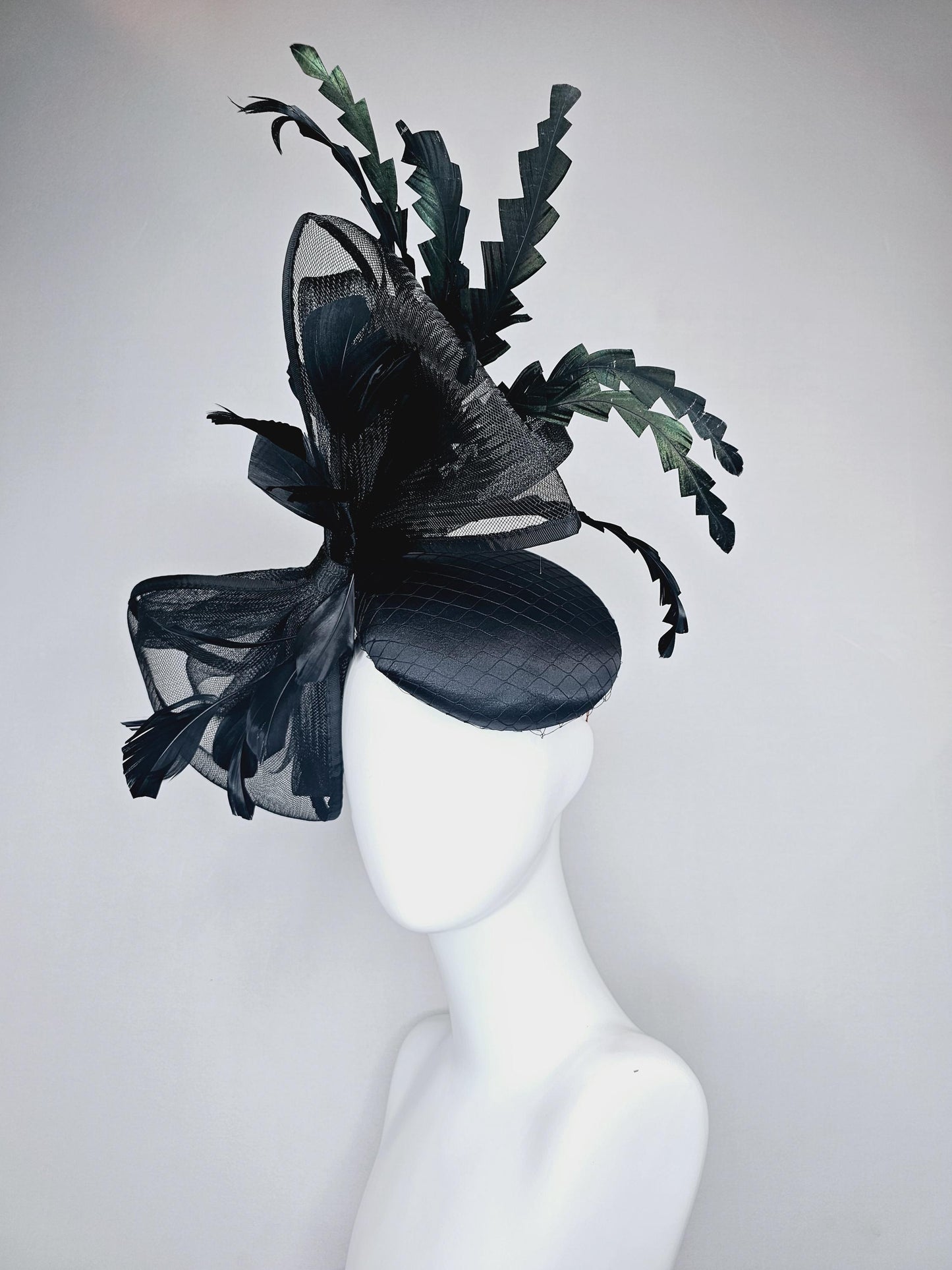 kentucky derby hat fascinator black satin with netting with large black mesh bow and black zigzag branching feathers