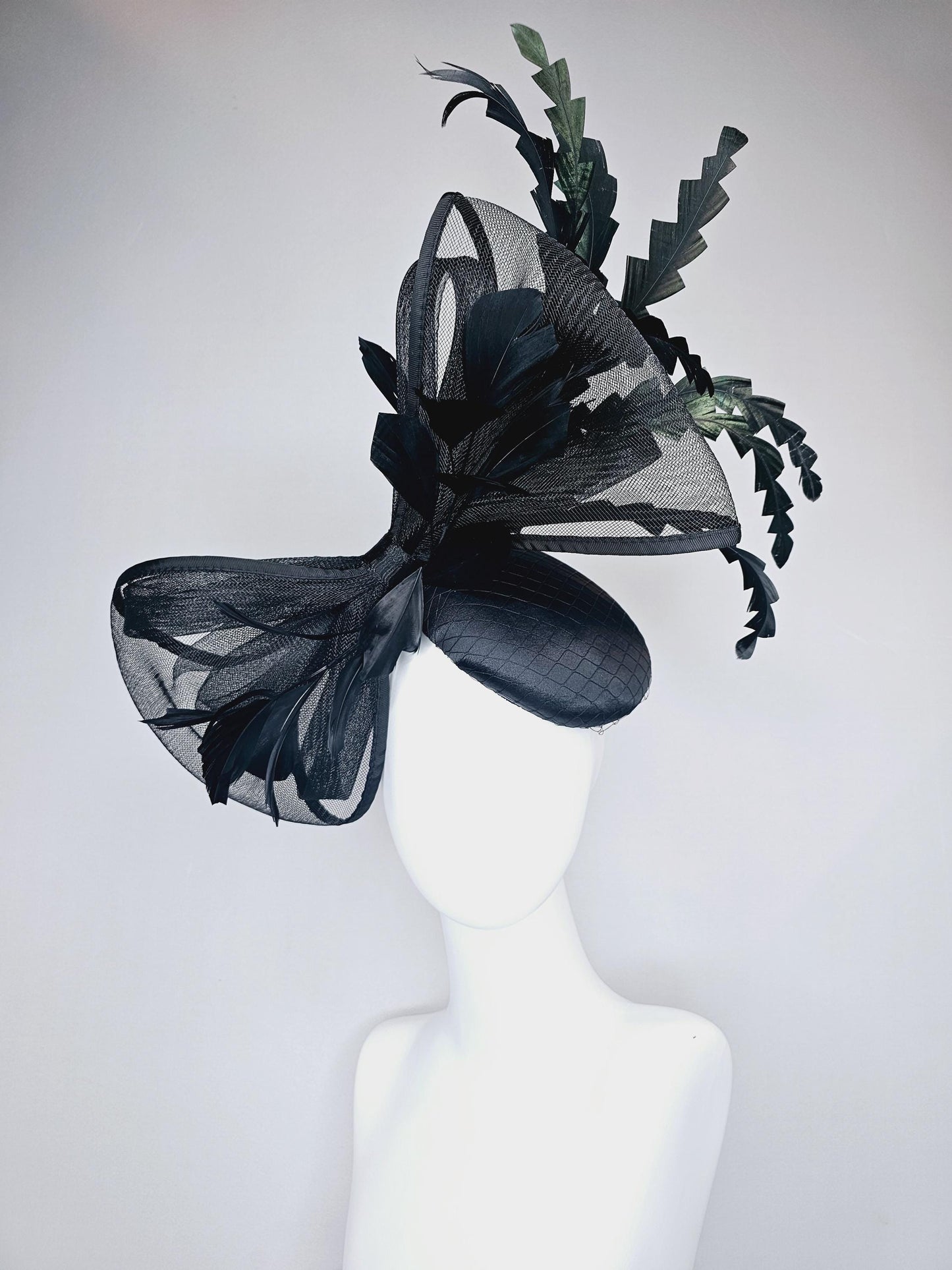 kentucky derby hat fascinator black satin with netting with large black mesh bow and black zigzag branching feathers