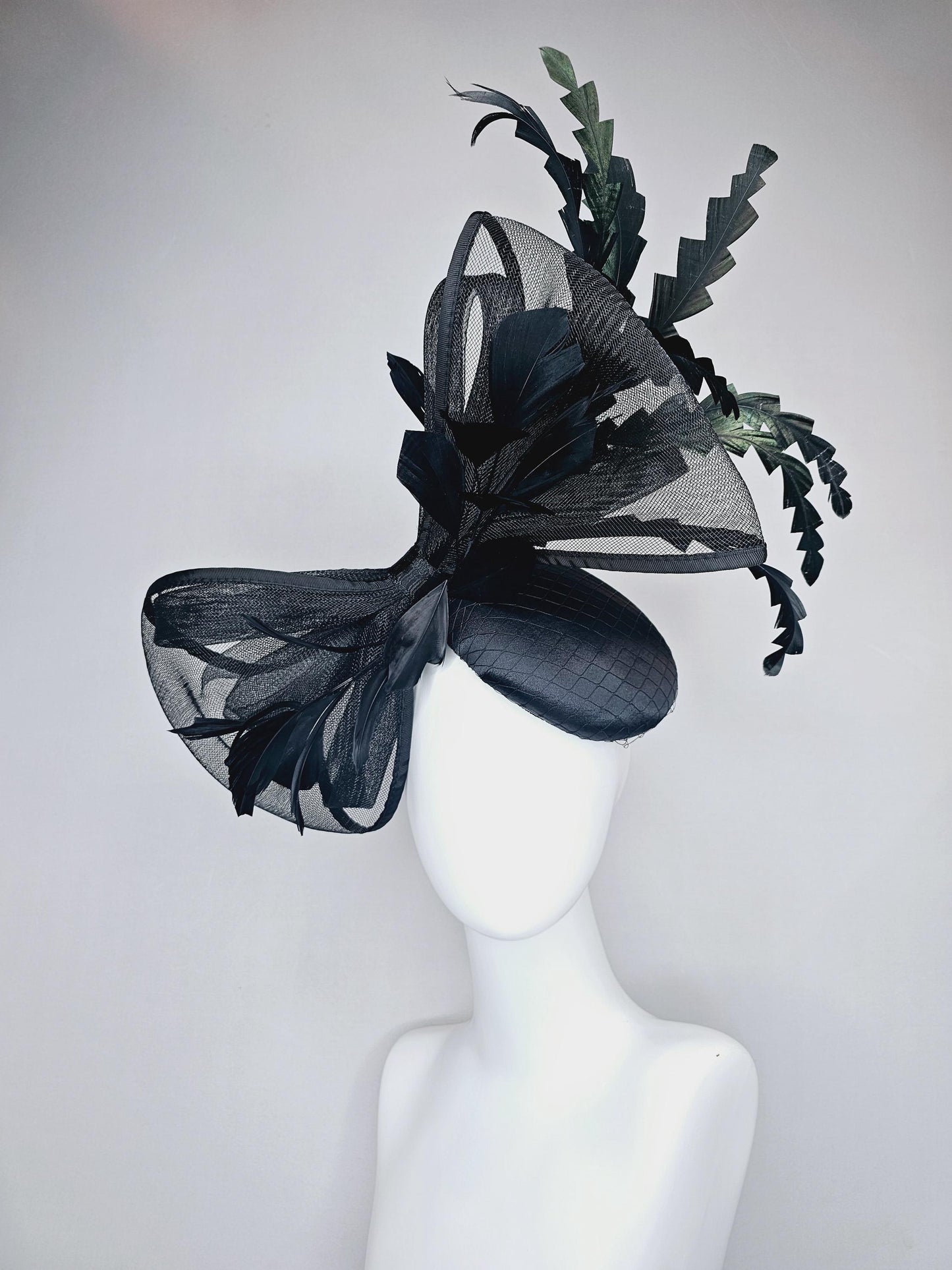 kentucky derby hat fascinator black satin with netting with large black mesh bow and black zigzag branching feathers
