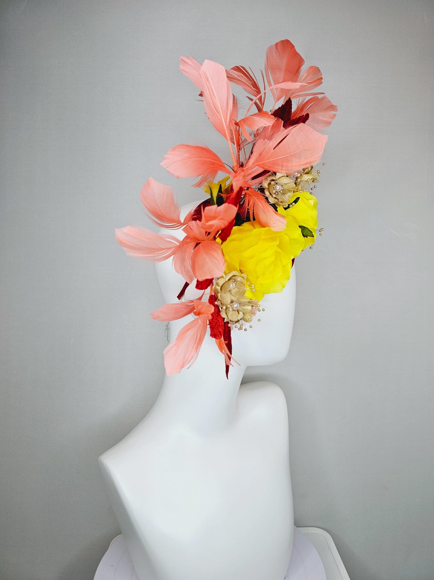 kentucky derby hat fascinator yellow satin roses,gold tan beige satin flowers with pearls,scarlet red leaves,coral orange branching feathers