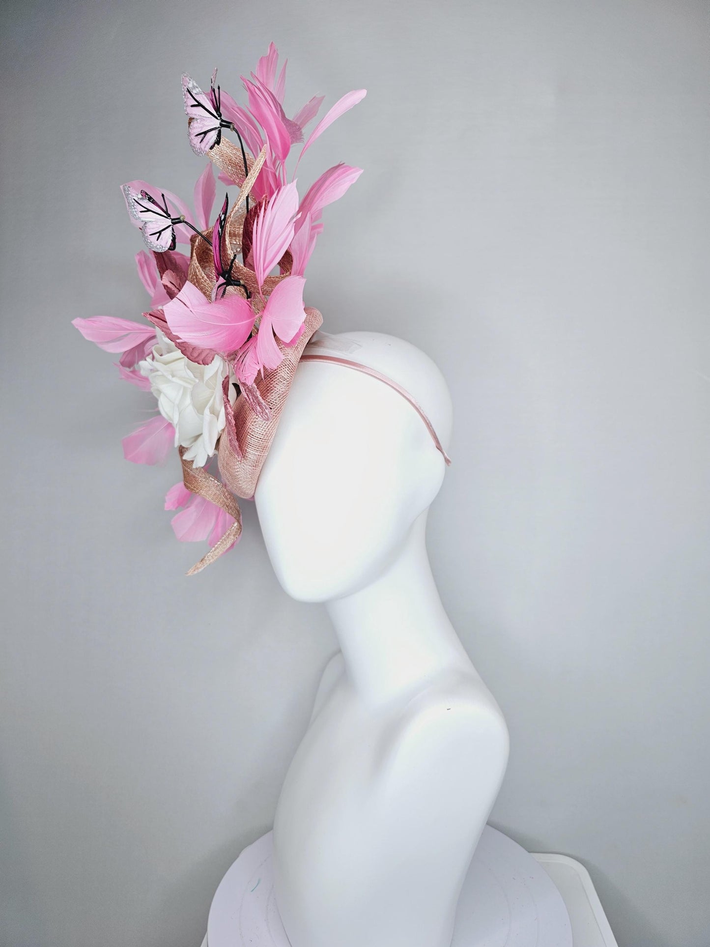kentucky derby hat fascinator blush pink sinamay w/ curls,ivory white satin rose,light rose pink leaves,pink feathers,pink black butterflies