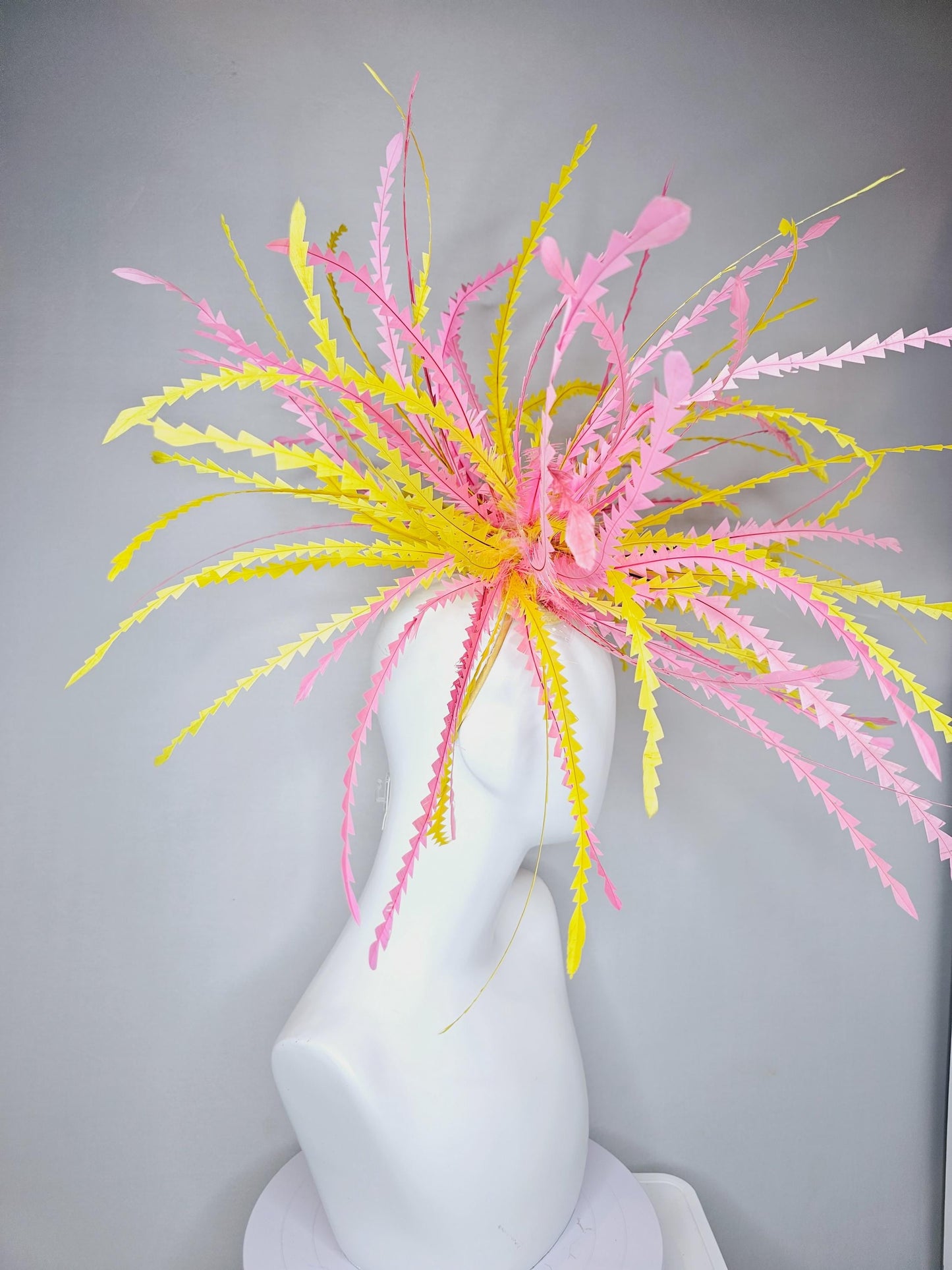 kentucky derby hat fascinator huge light pink and bright yellow zigzag feather headpiece