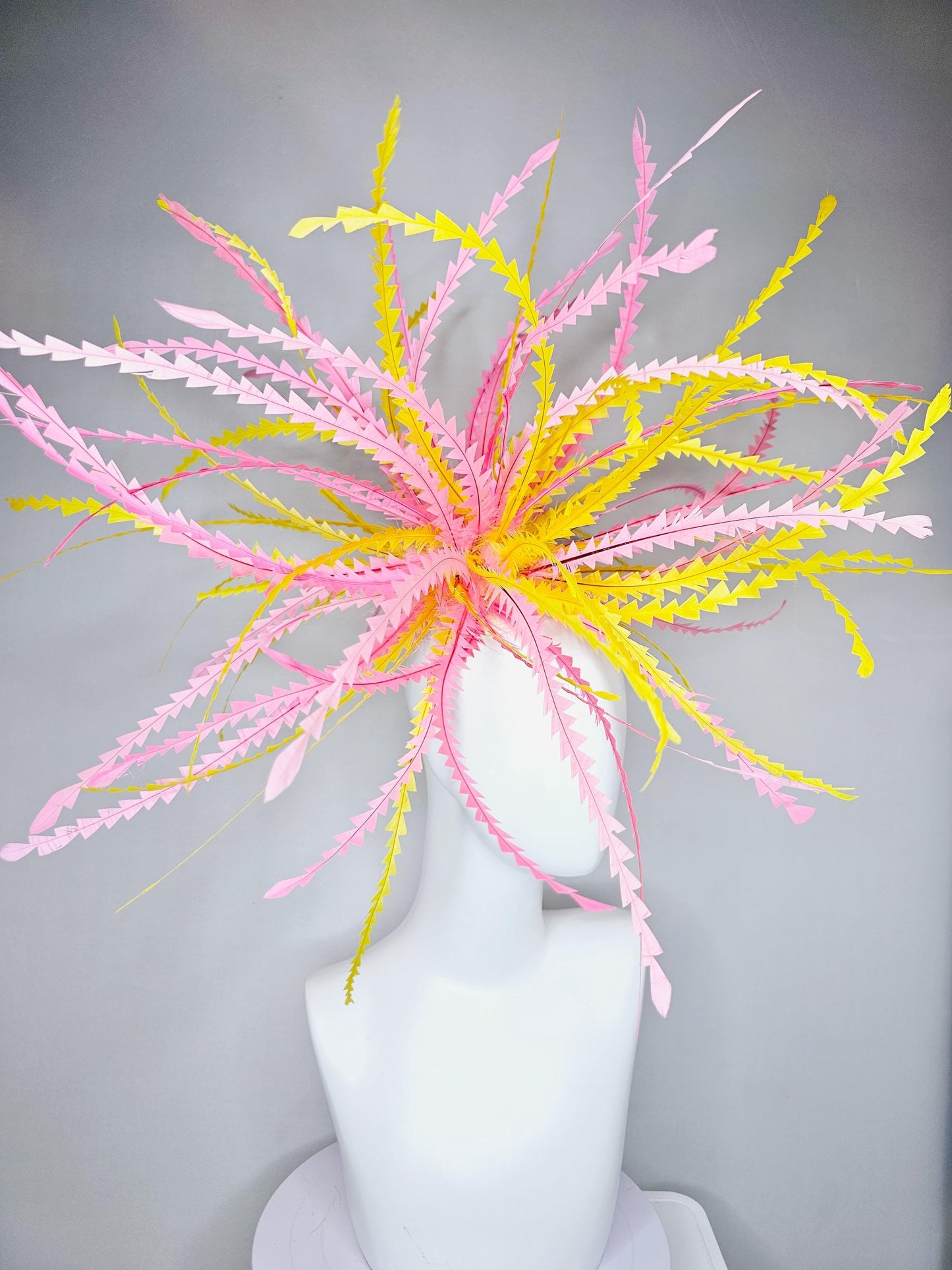 kentucky derby hat fascinator huge light pink and bright yellow zigzag feather headpiece