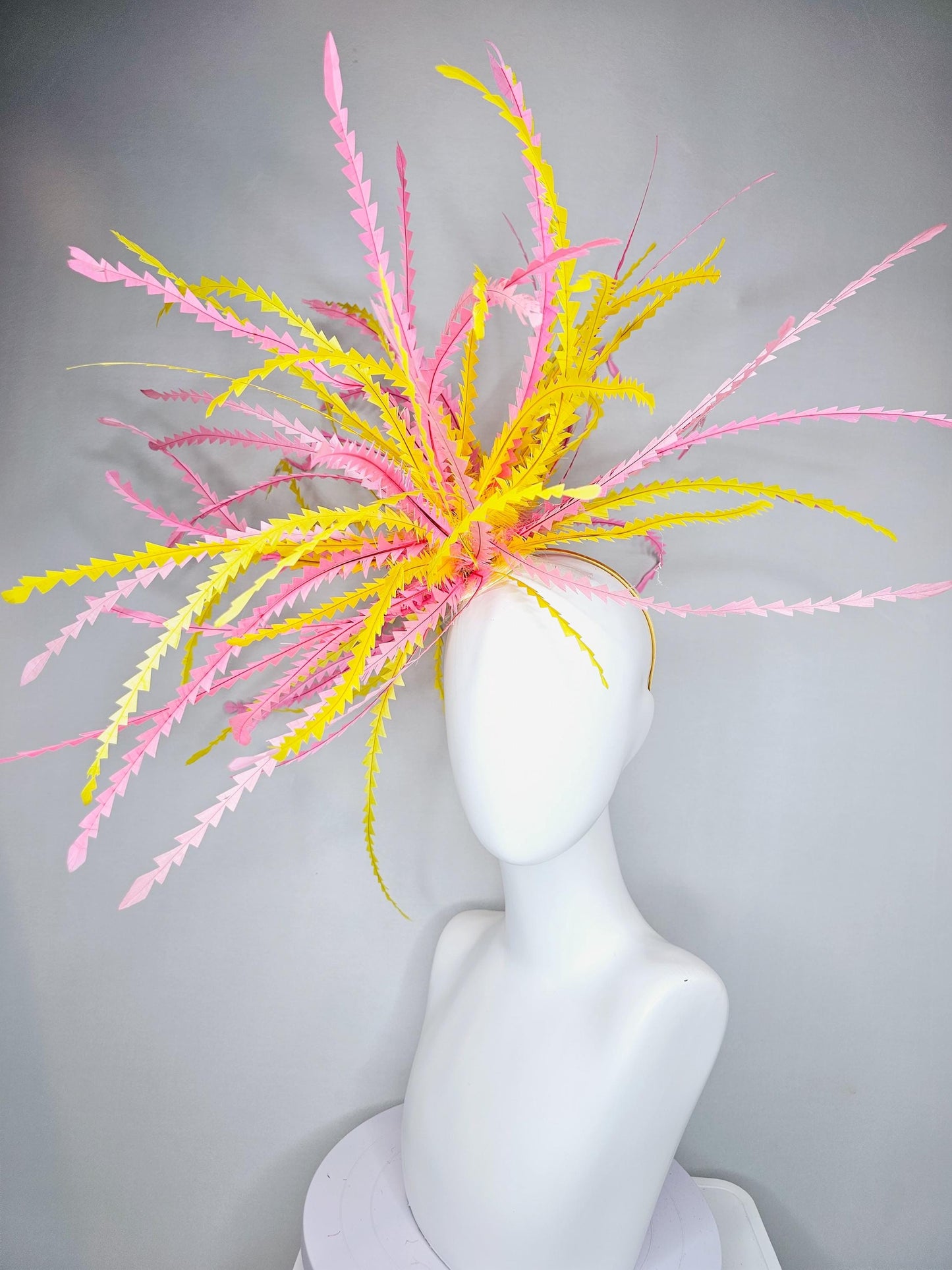 kentucky derby hat fascinator huge light pink and bright yellow zigzag feather headpiece
