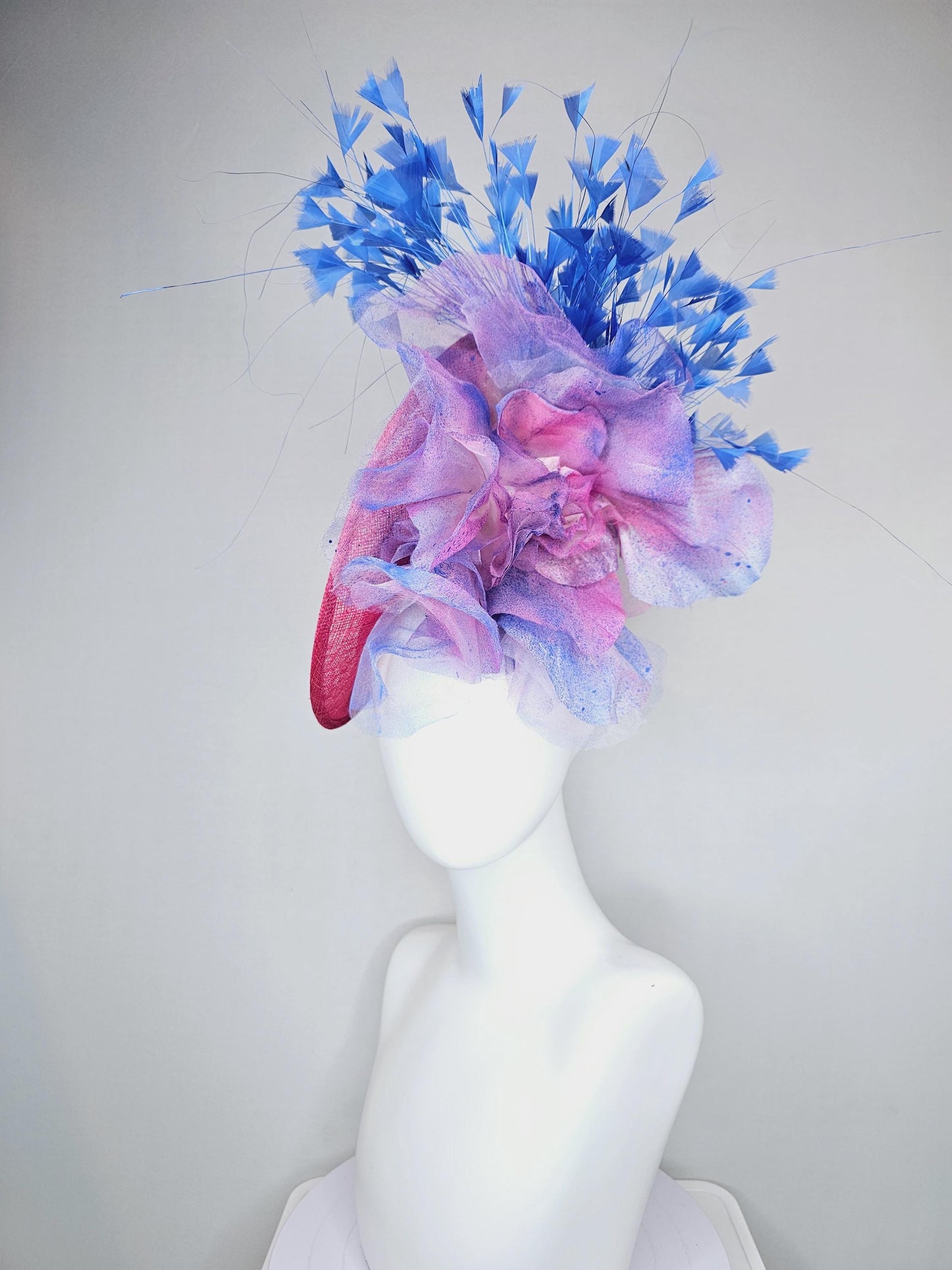 kentucky derby hat fascinator raspberry pink sinamay saucer with large pink blue tie dye organza satin rose, cobalt blue branching feathers