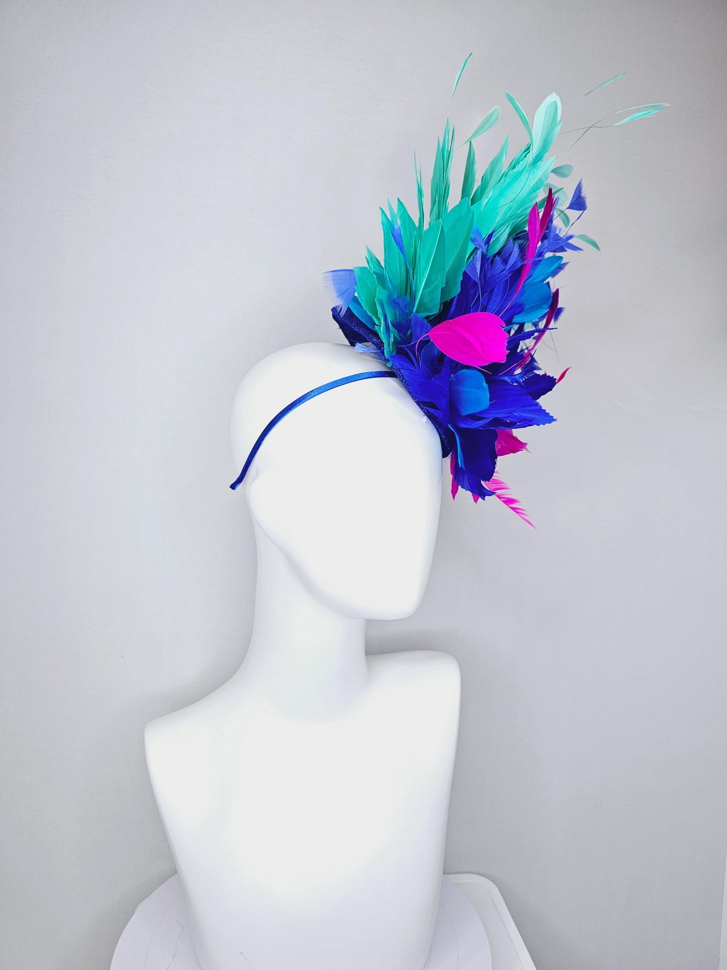 kentucky derby hat fascinator royal blue sinamay,fuchsia pink royal blue feather flower,royal cobalt blue mint green pink branching feathers