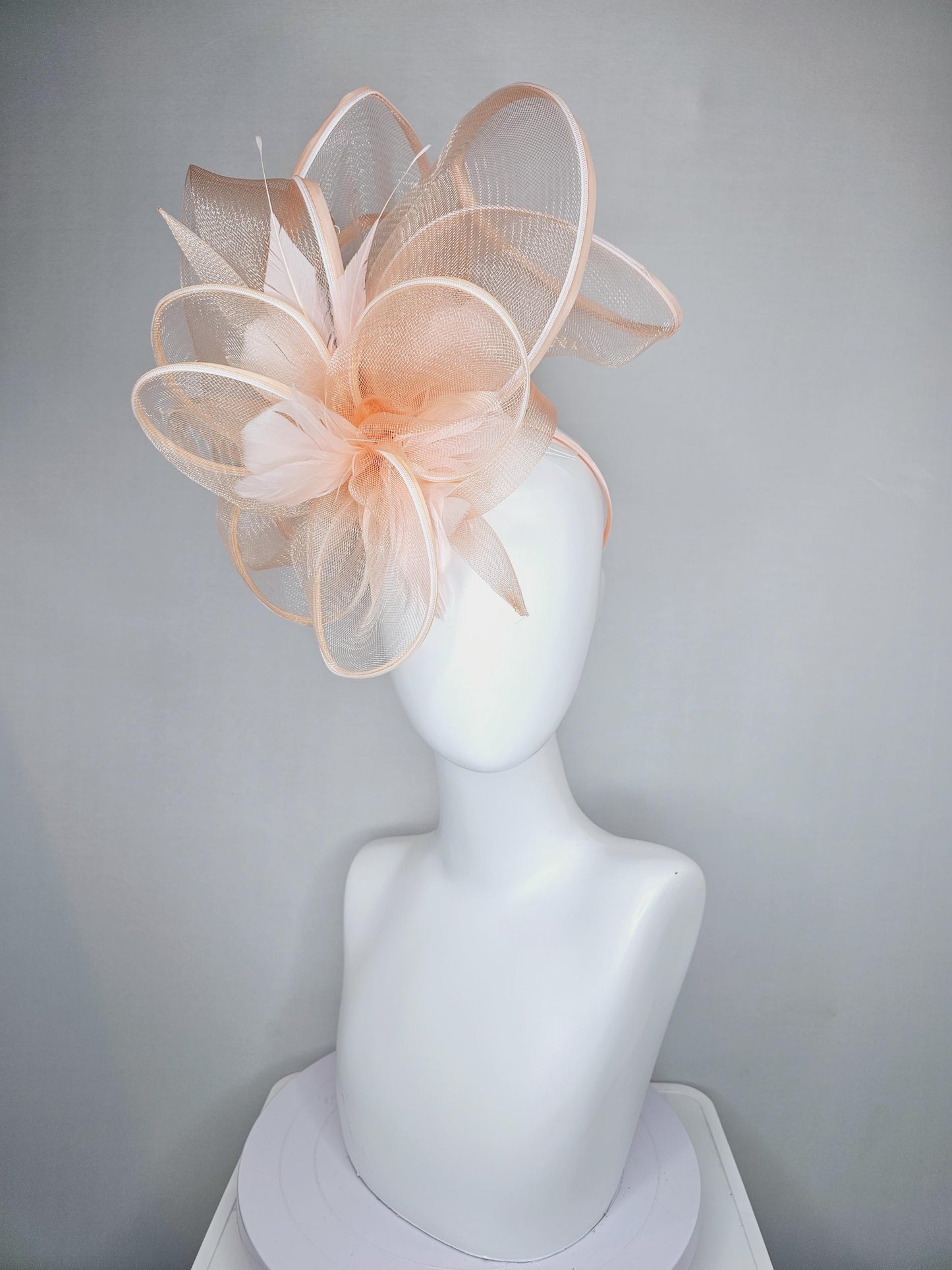 kentucky derby hat fascinator with light blush pink mesh and wired ribbon large bendable decor with light blush pink branching feathers