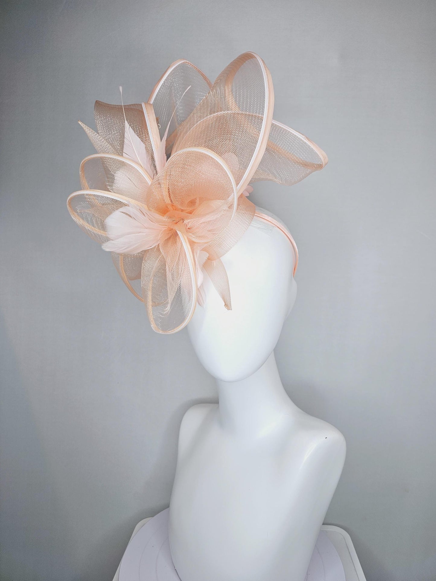 kentucky derby hat fascinator with light blush pink mesh and wired ribbon large bendable decor with light blush pink branching feathers
