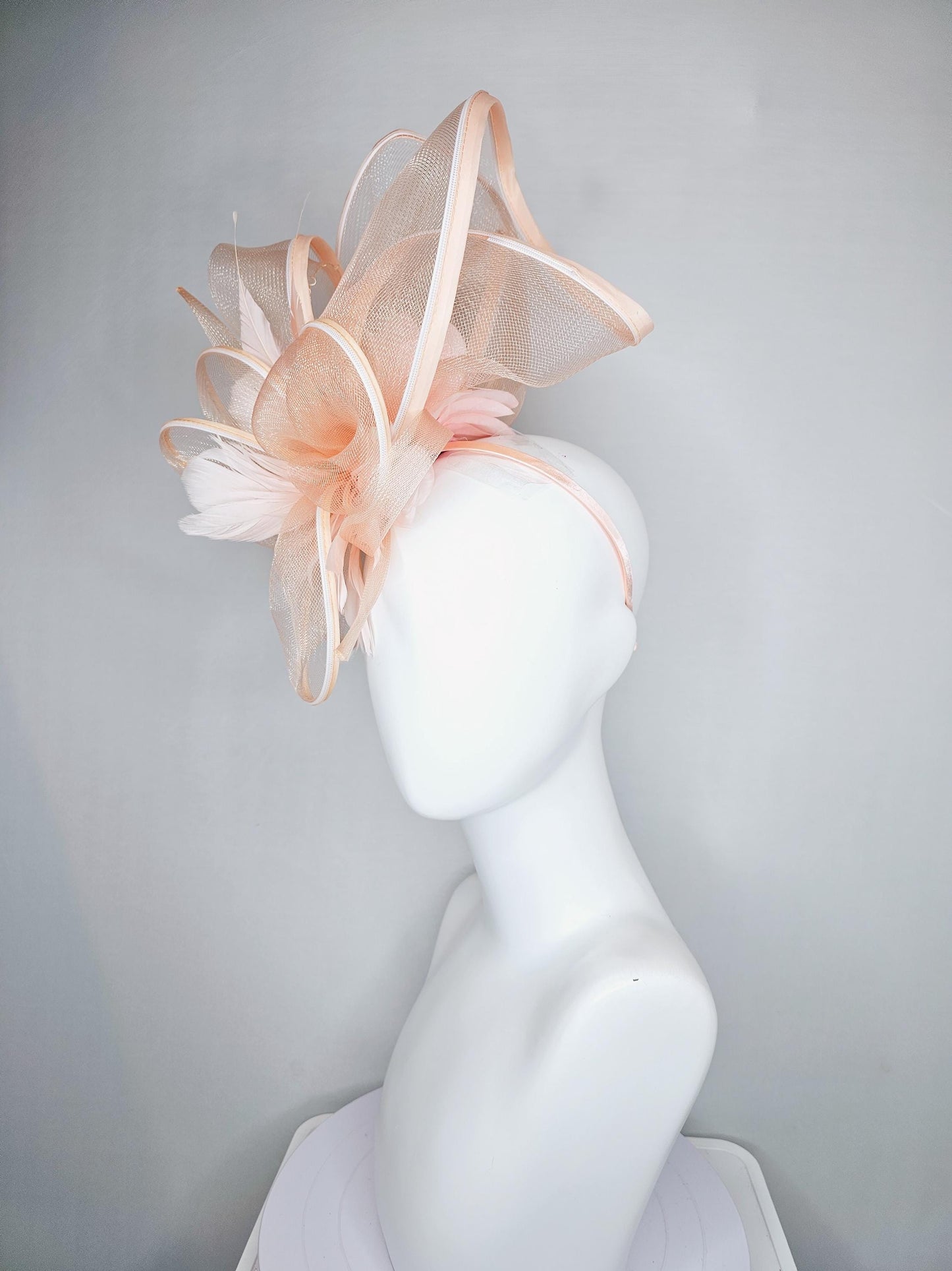 kentucky derby hat fascinator with light blush pink mesh and wired ribbon large bendable decor with light blush pink branching feathers