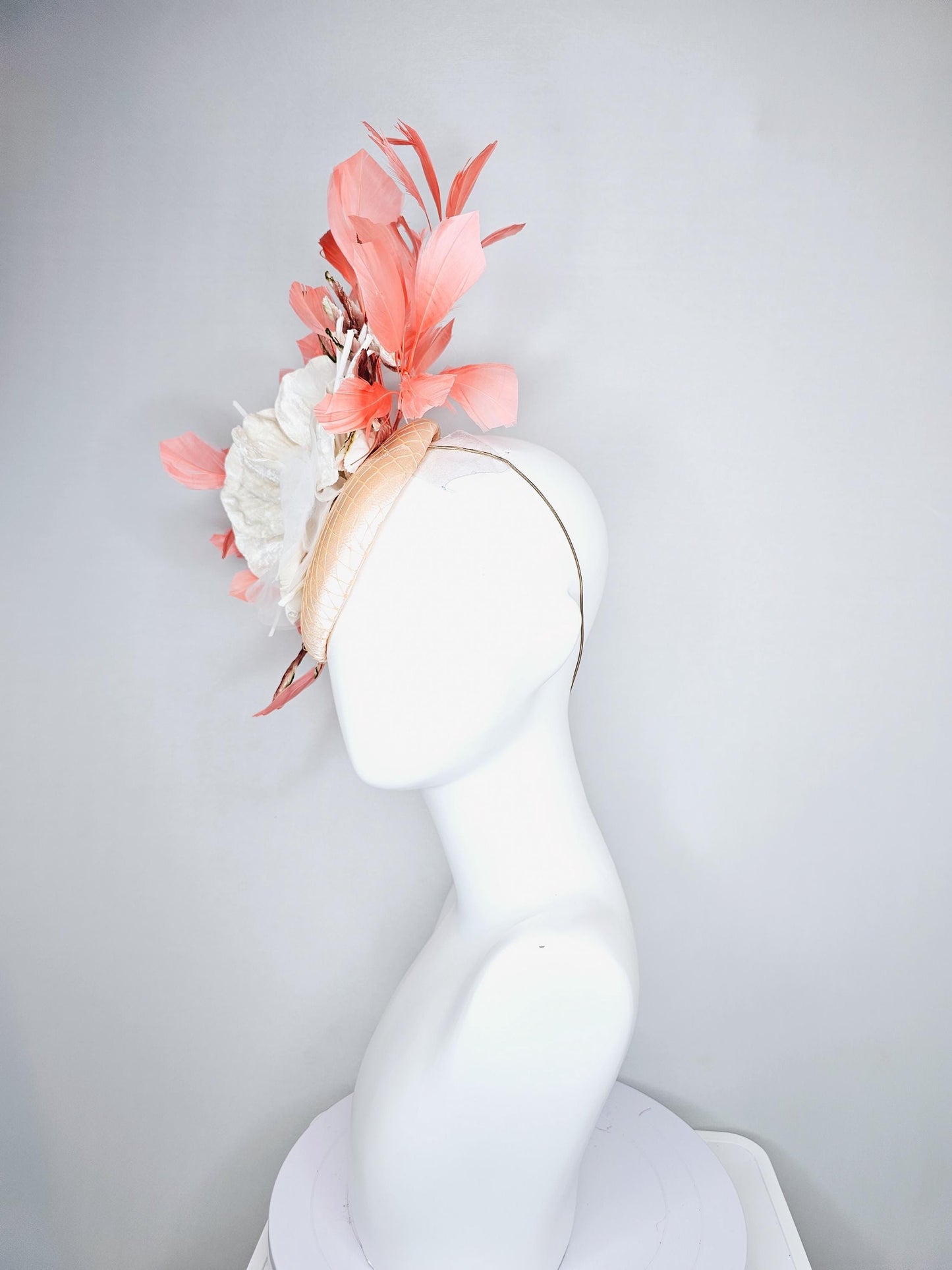 kentucky derby hat fascinator neutral beige satin with netting, white organza flowers, orange ombre leaves, orange peach branching feathers