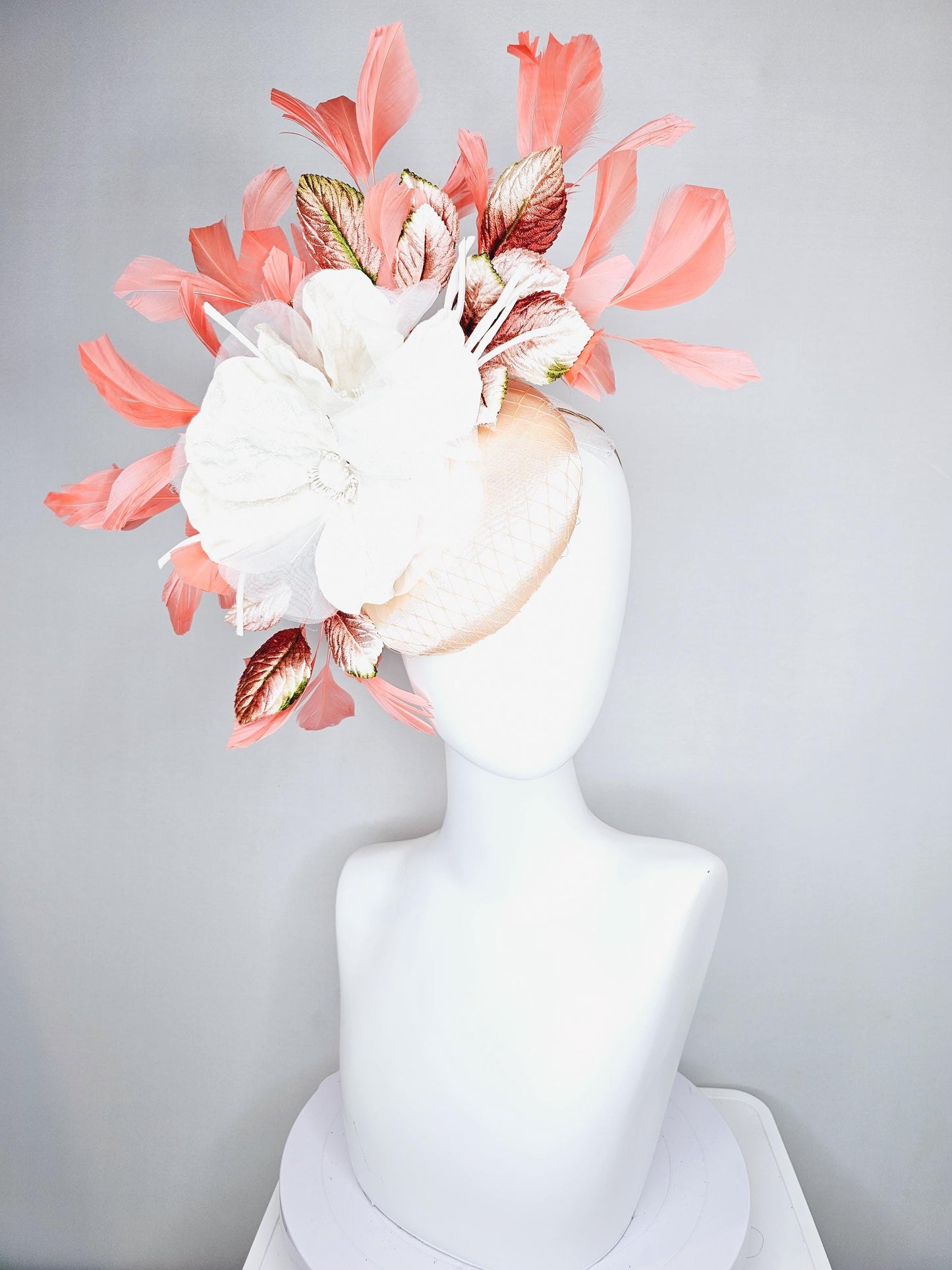 kentucky derby hat fascinator neutral beige satin with netting, white organza flowers, orange ombre leaves, orange peach branching feathers