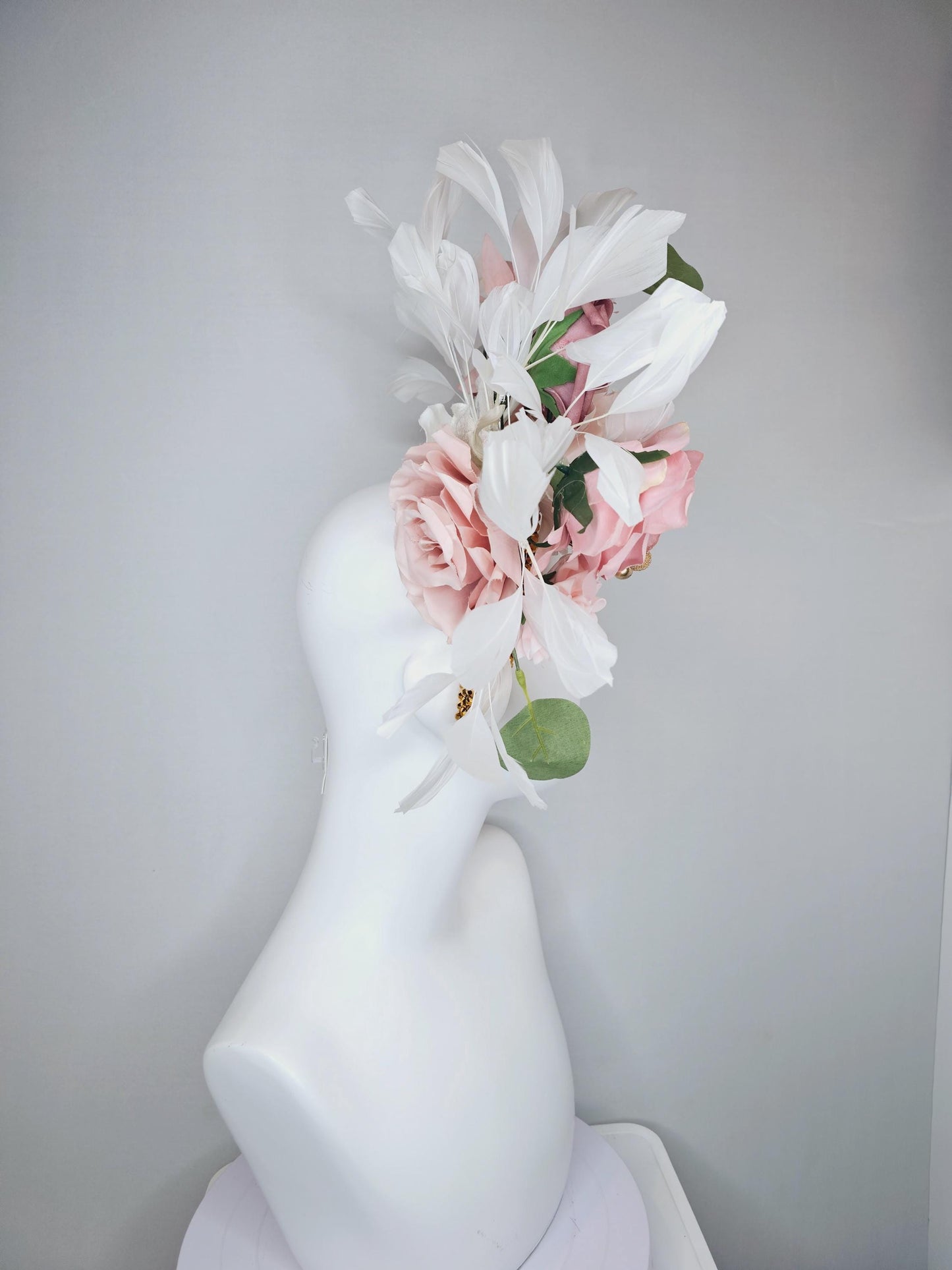 kentucky derby hat fascinator gold crystal headband, light pink dusty pink satin flowers, green leaves, ivory white feathers