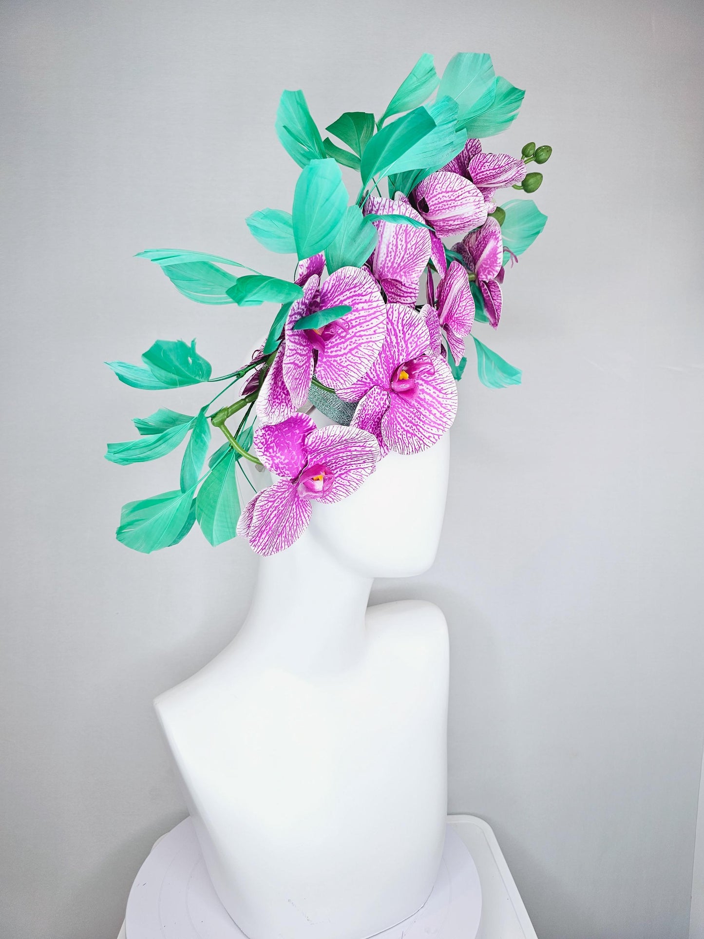 kentucky derby hat fascinator white and purple orchid satin silk flowers, bright mint green branching feathers