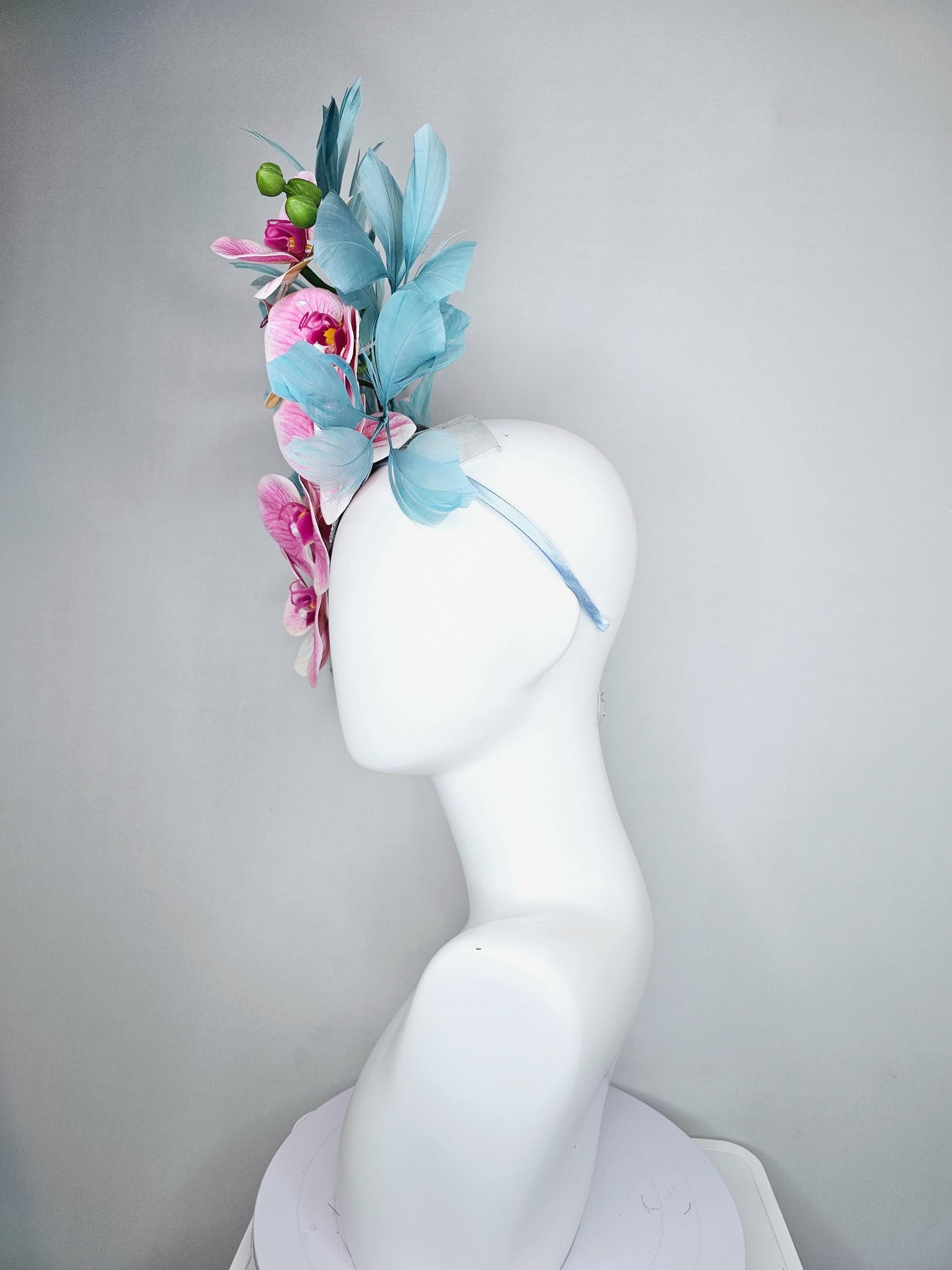 kentucky derby hat fascinator large white and blush pink orchid satin silk flowers, teal blue branching feathers