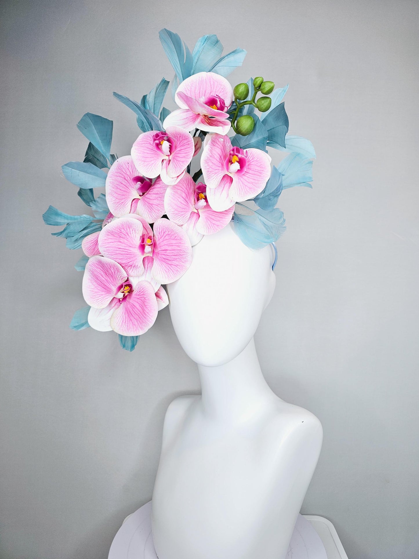 kentucky derby hat fascinator large white and blush pink orchid satin silk flowers, teal blue branching feathers