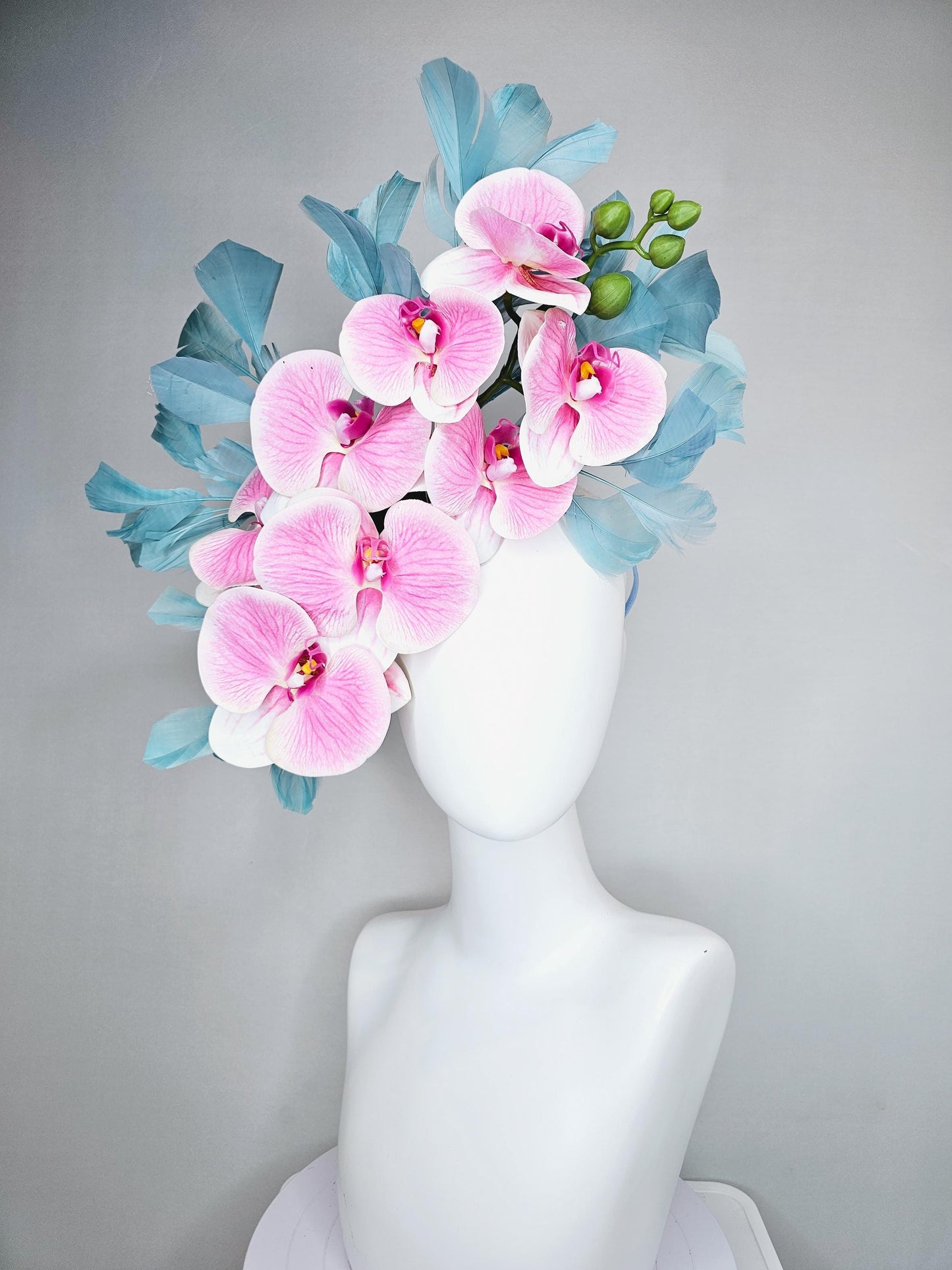 kentucky derby hat fascinator large white and blush pink orchid satin silk flowers, teal blue branching feathers