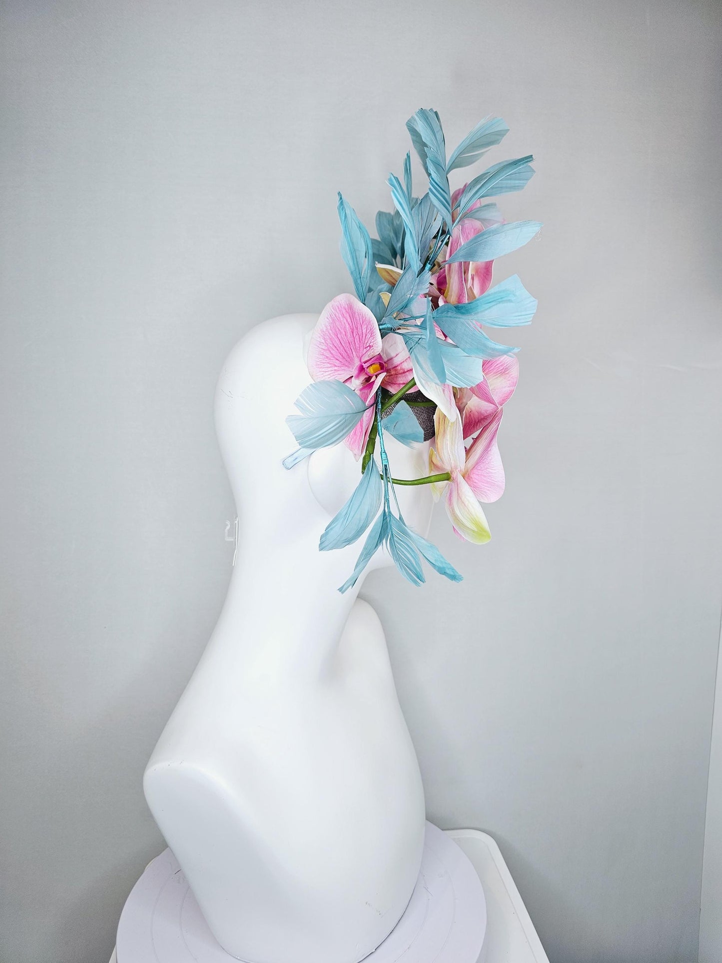 kentucky derby hat fascinator large white and blush pink orchid satin silk flowers, teal blue branching feathers