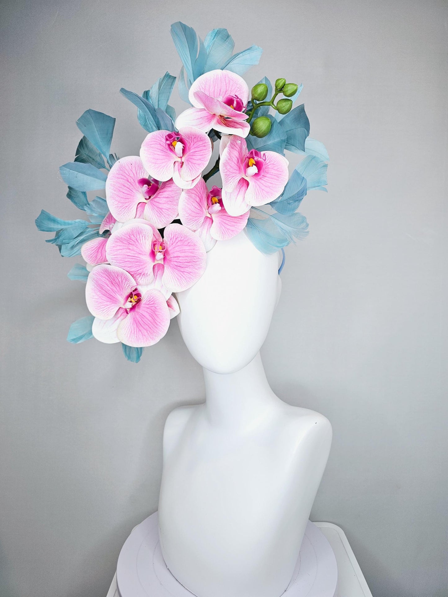 kentucky derby hat fascinator large white and blush pink orchid satin silk flowers, teal blue branching feathers