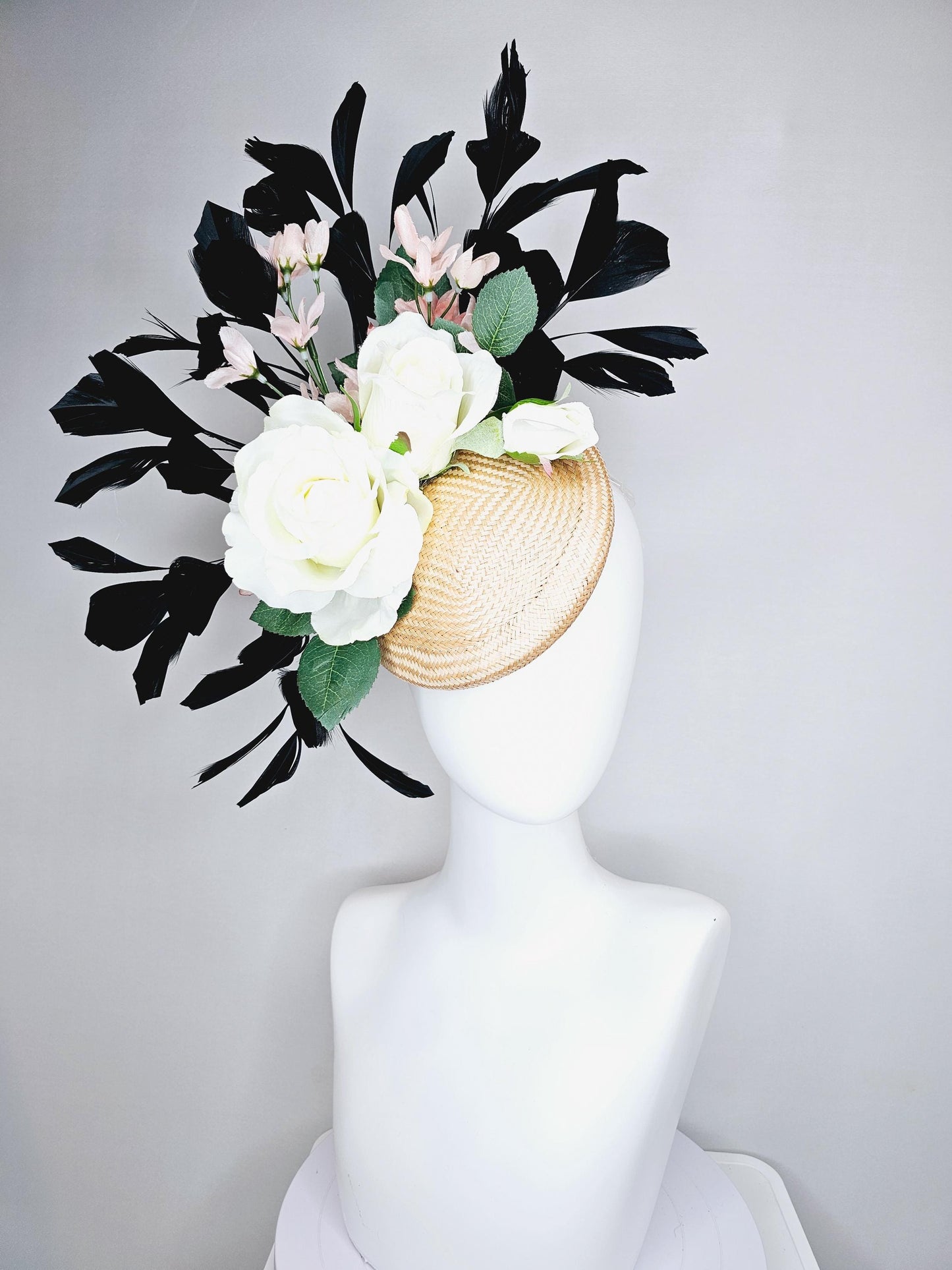 kentucky derby hat fascinator tan straw w/ neutral ivory white satin rose flowers,green leaves, light pink flowers, black branching feathers