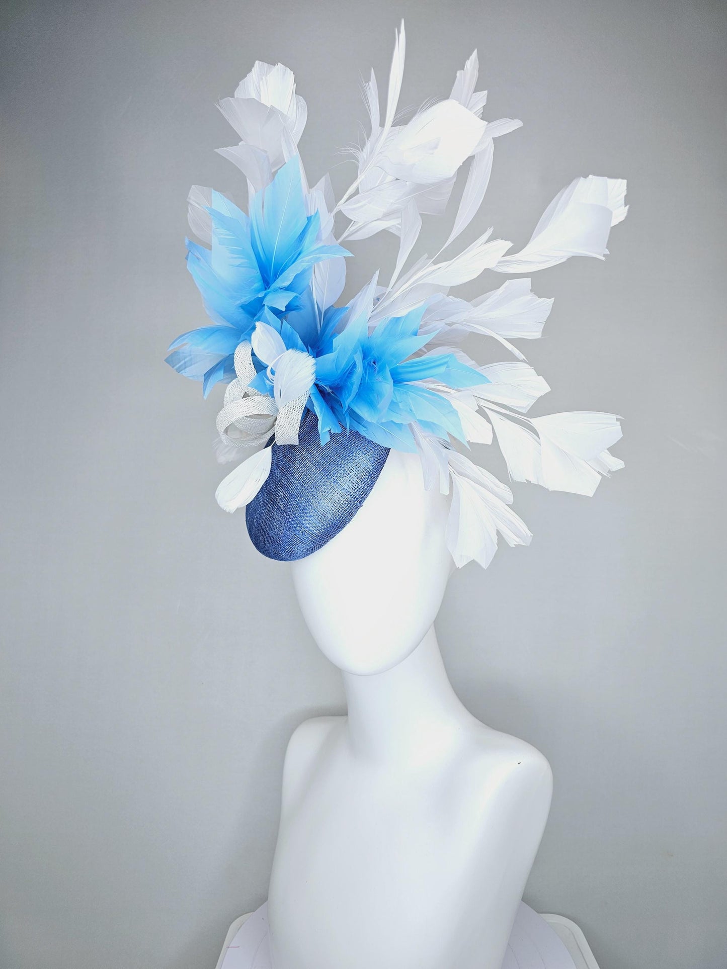 kentucky derby hat fascinator dark blue sinamay base with white sinamay bow, sky blue and white branching feathers