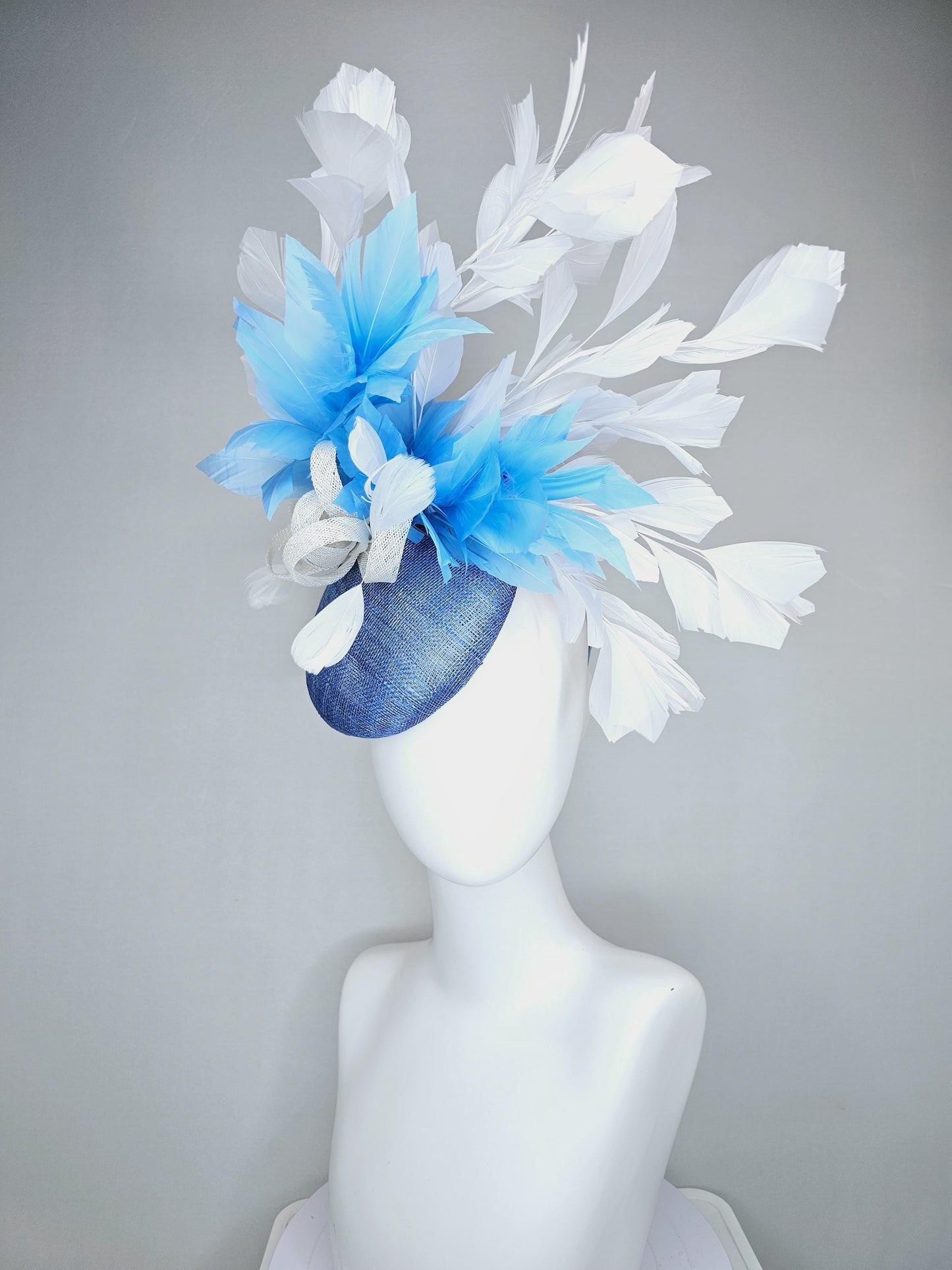 kentucky derby hat fascinator dark blue sinamay base with white sinamay bow, sky blue and white branching feathers