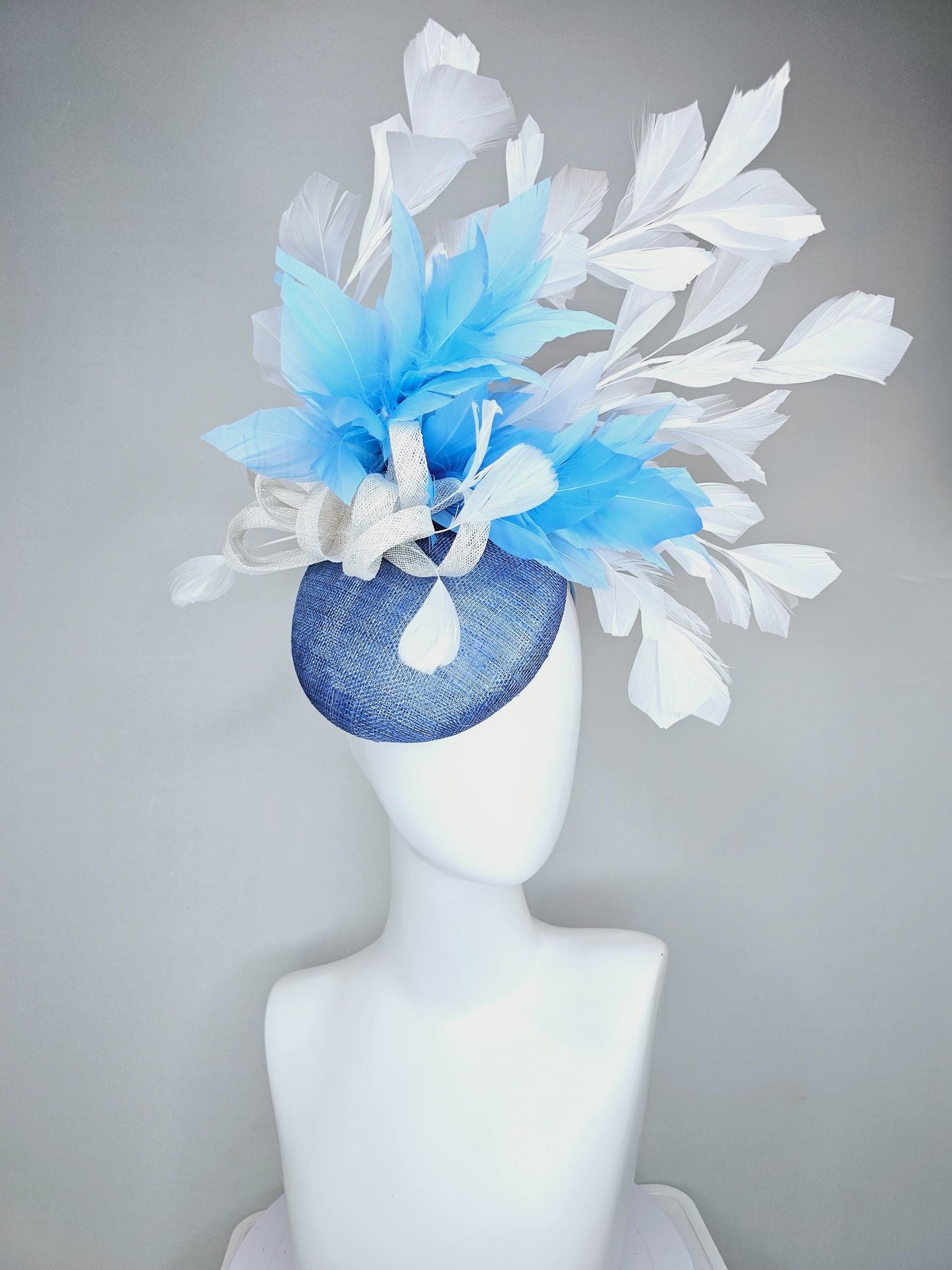 kentucky derby hat fascinator dark blue sinamay base with white sinamay bow, sky blue and white branching feathers