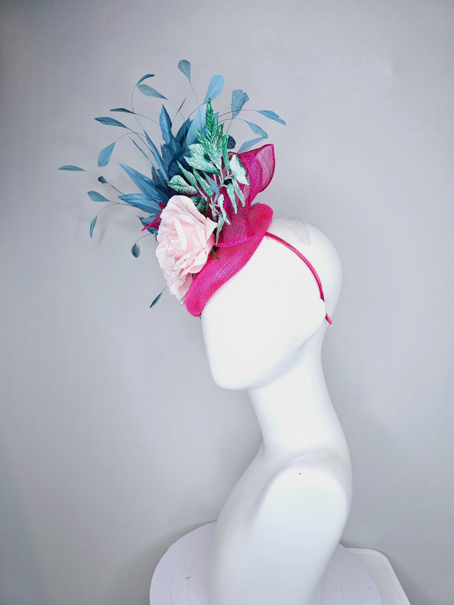 kentucky derby hat fascinator pink sinamay base with sinamay bow, sky blue branching feathers, mint green leaves,light pink satin silk roses