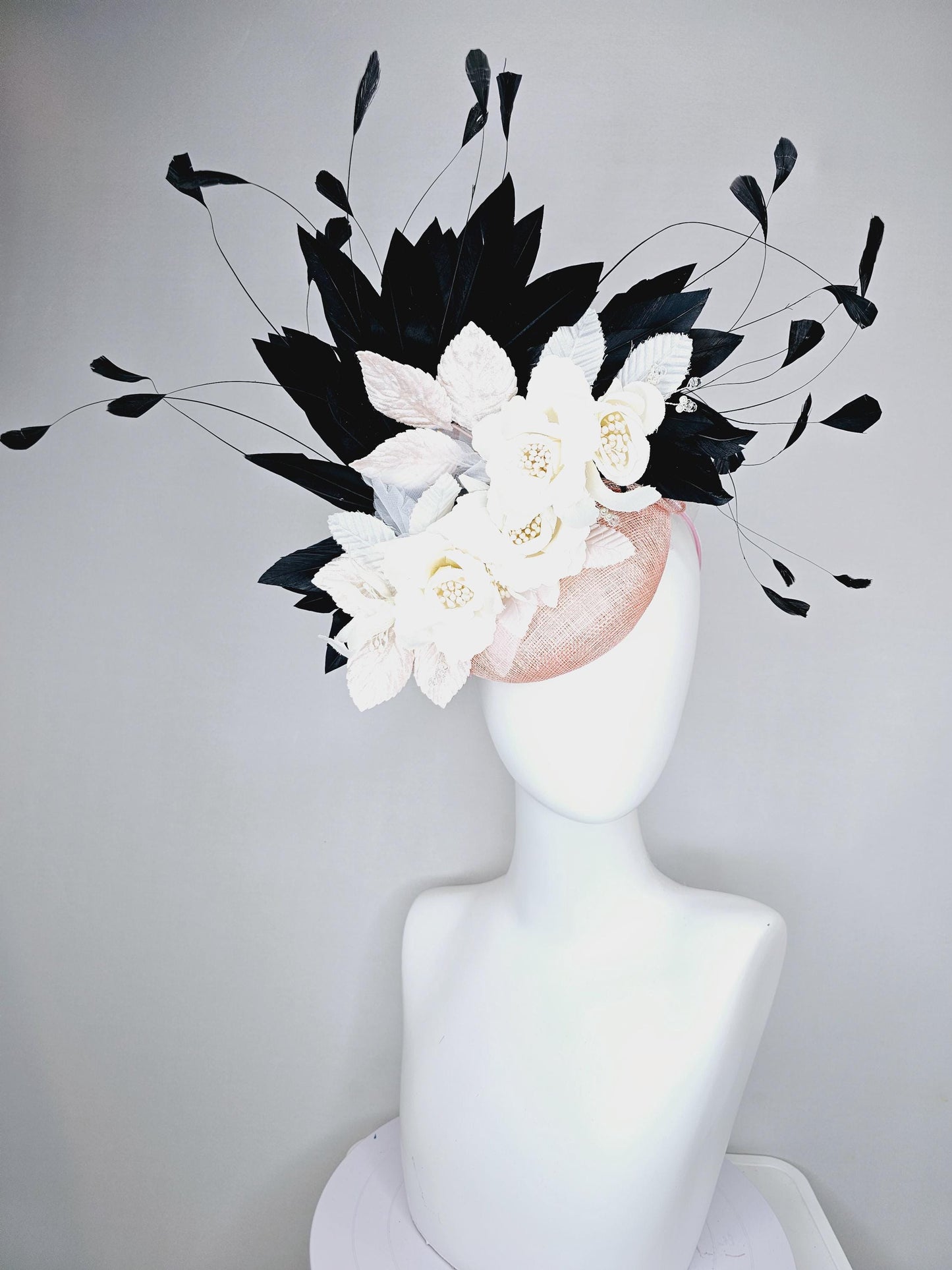 kentucky derby hat fascinator light pink sinamay with ivory white satin silk flowers, light pink white leaves, black branching feathers
