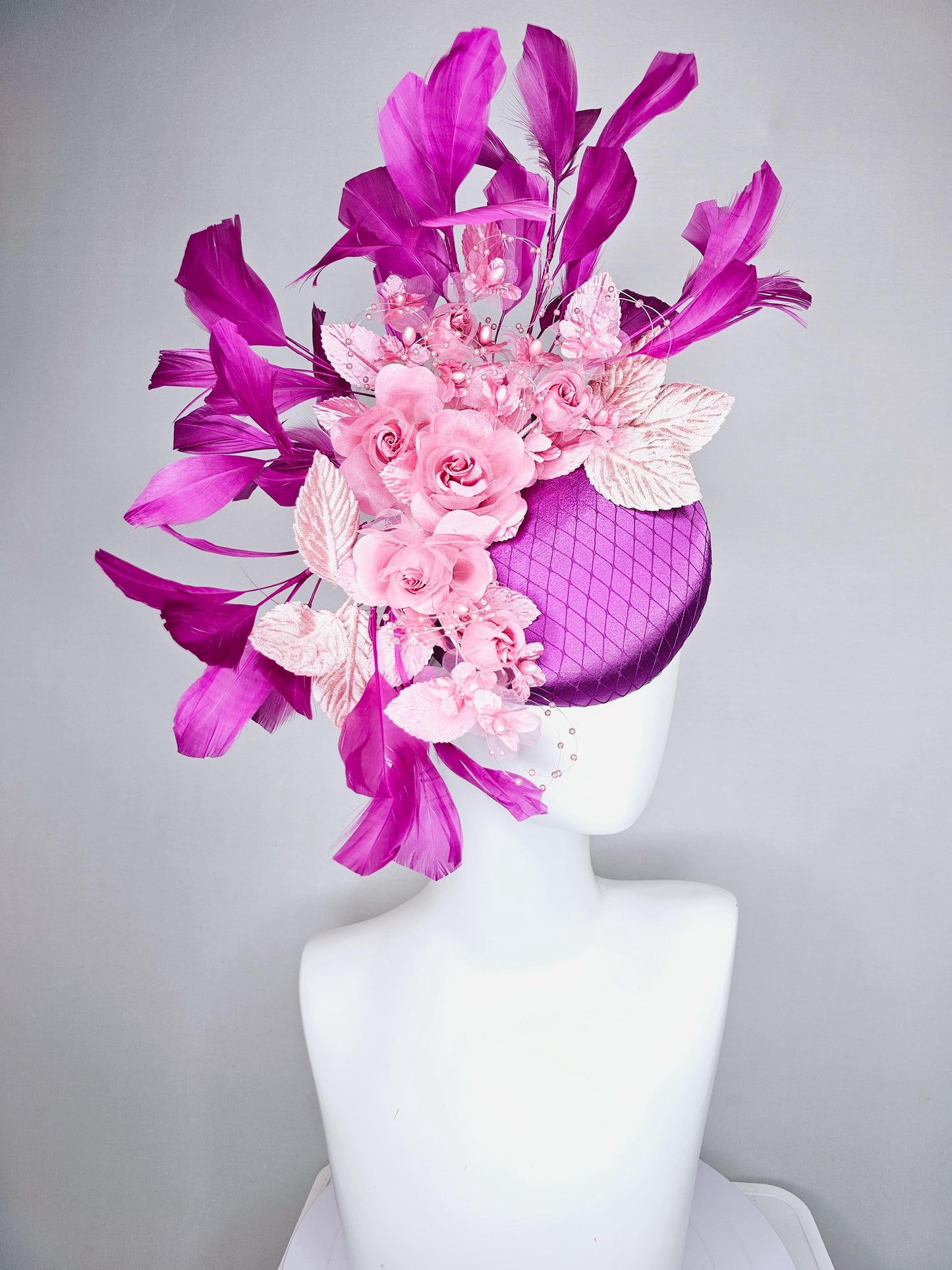kentucky derby hat fascinator purple satin with netting, light blush pink organza satin flowers, light pink leaves, magenta purple feathers