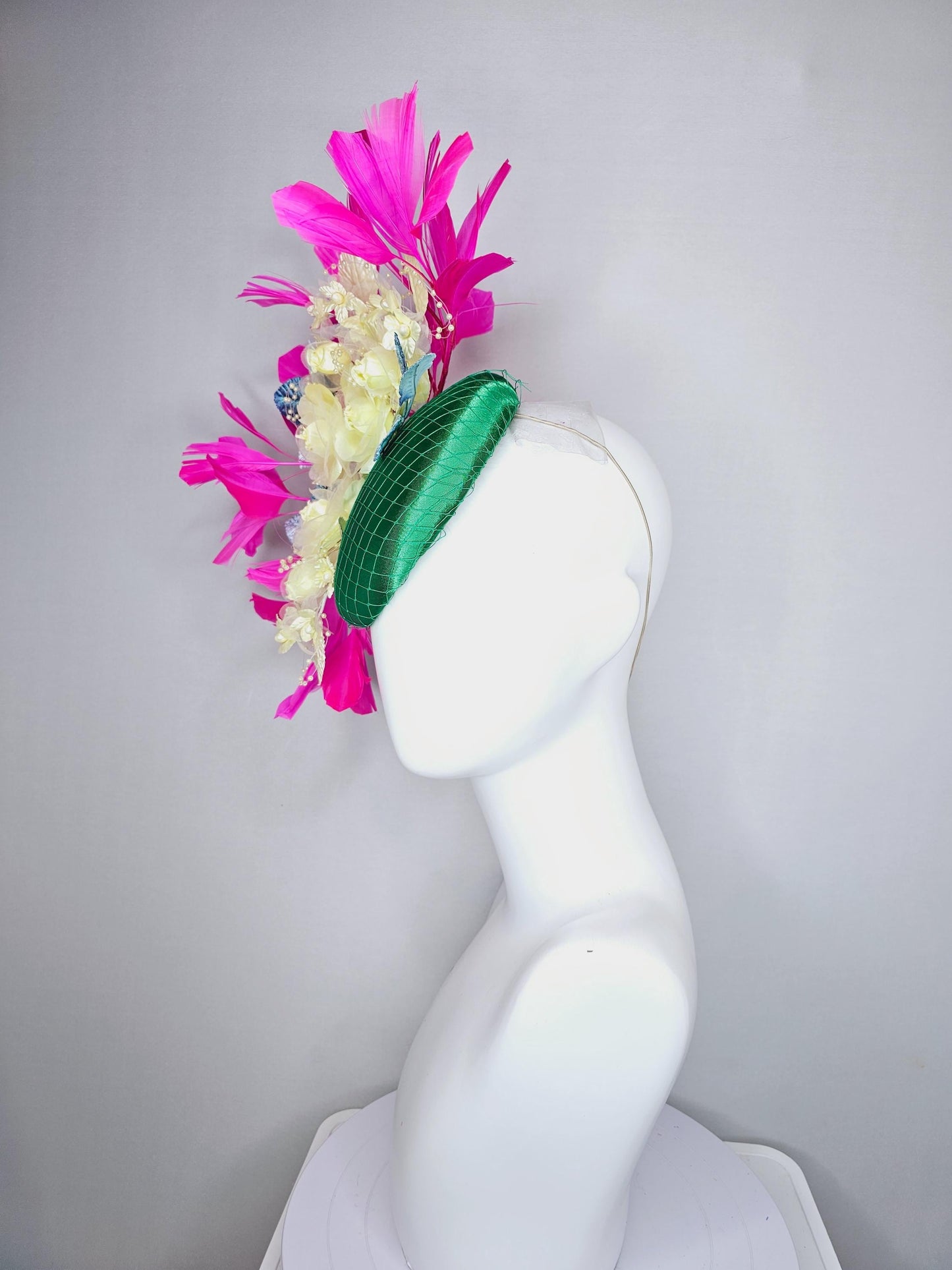 kentucky derby hat fascinator emerald green satin with netting, light yellow organza satin flowers, ombre blue leaves, pink fuchsia feathers