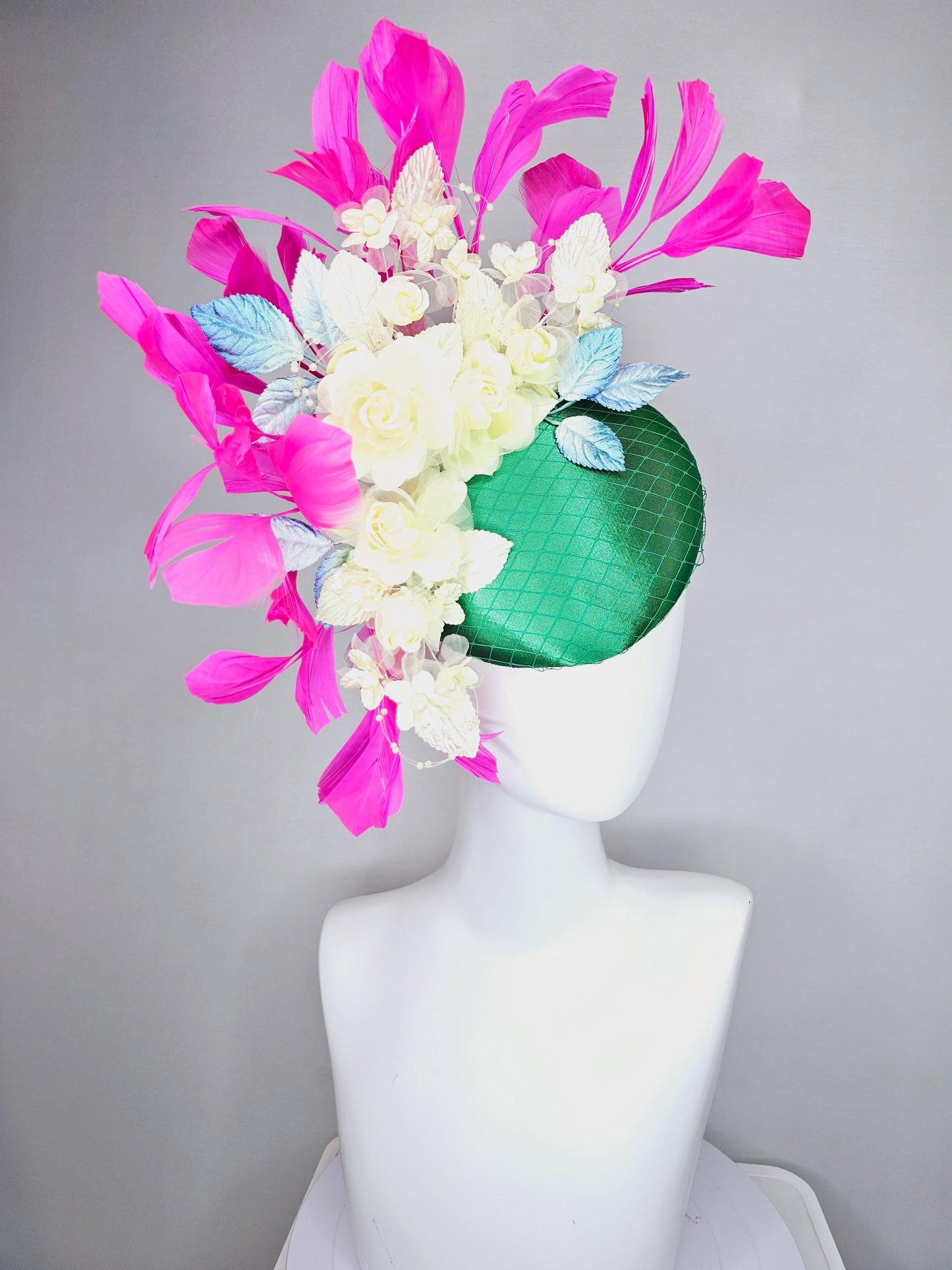 kentucky derby hat fascinator emerald green satin with netting, light yellow organza satin flowers, ombre blue leaves, pink fuchsia feathers