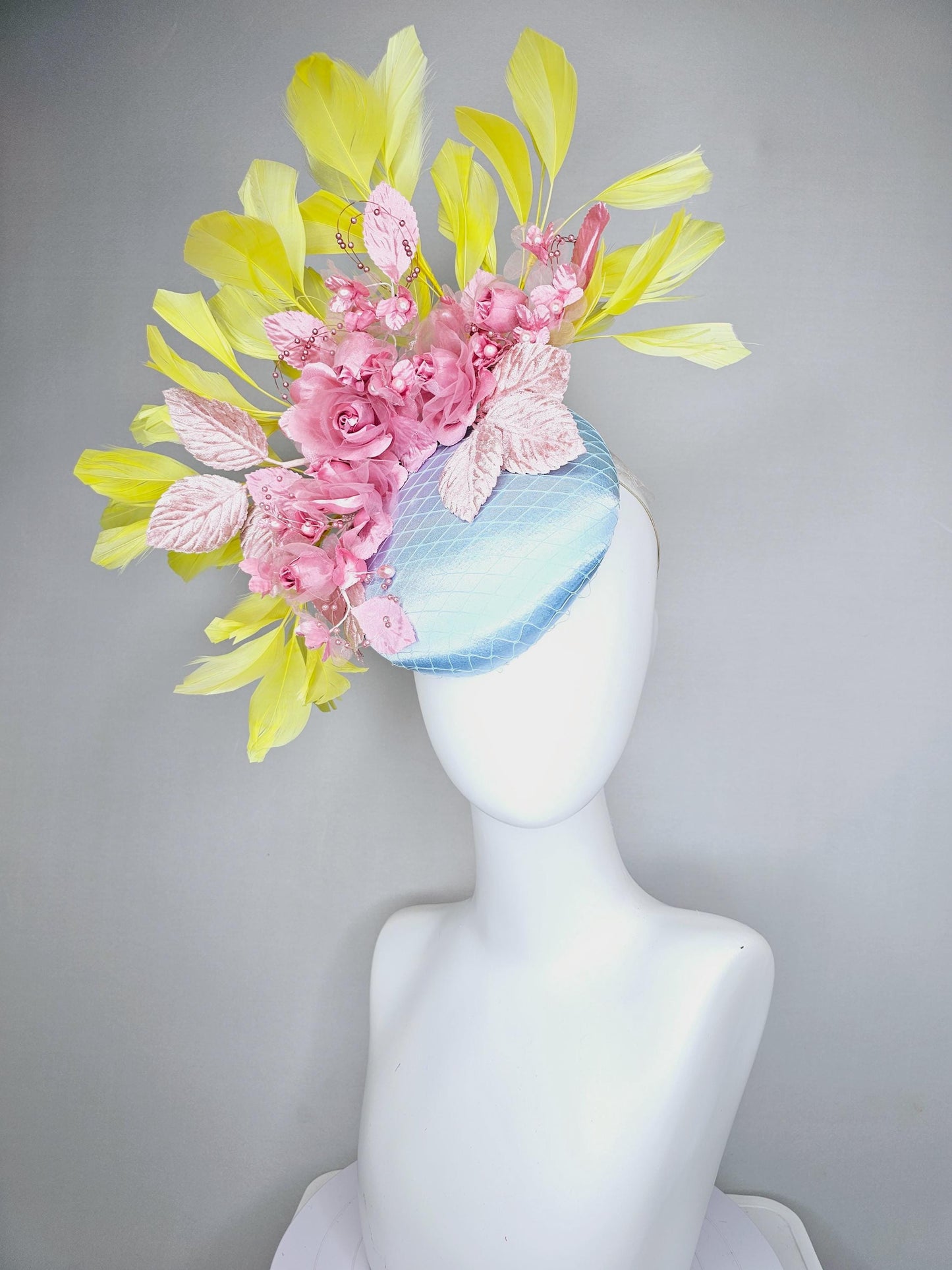 kentucky derby hat fascinator baby blue satin with netting, blush pink organza satin flowers, light pink leaves, yellow branching feathers