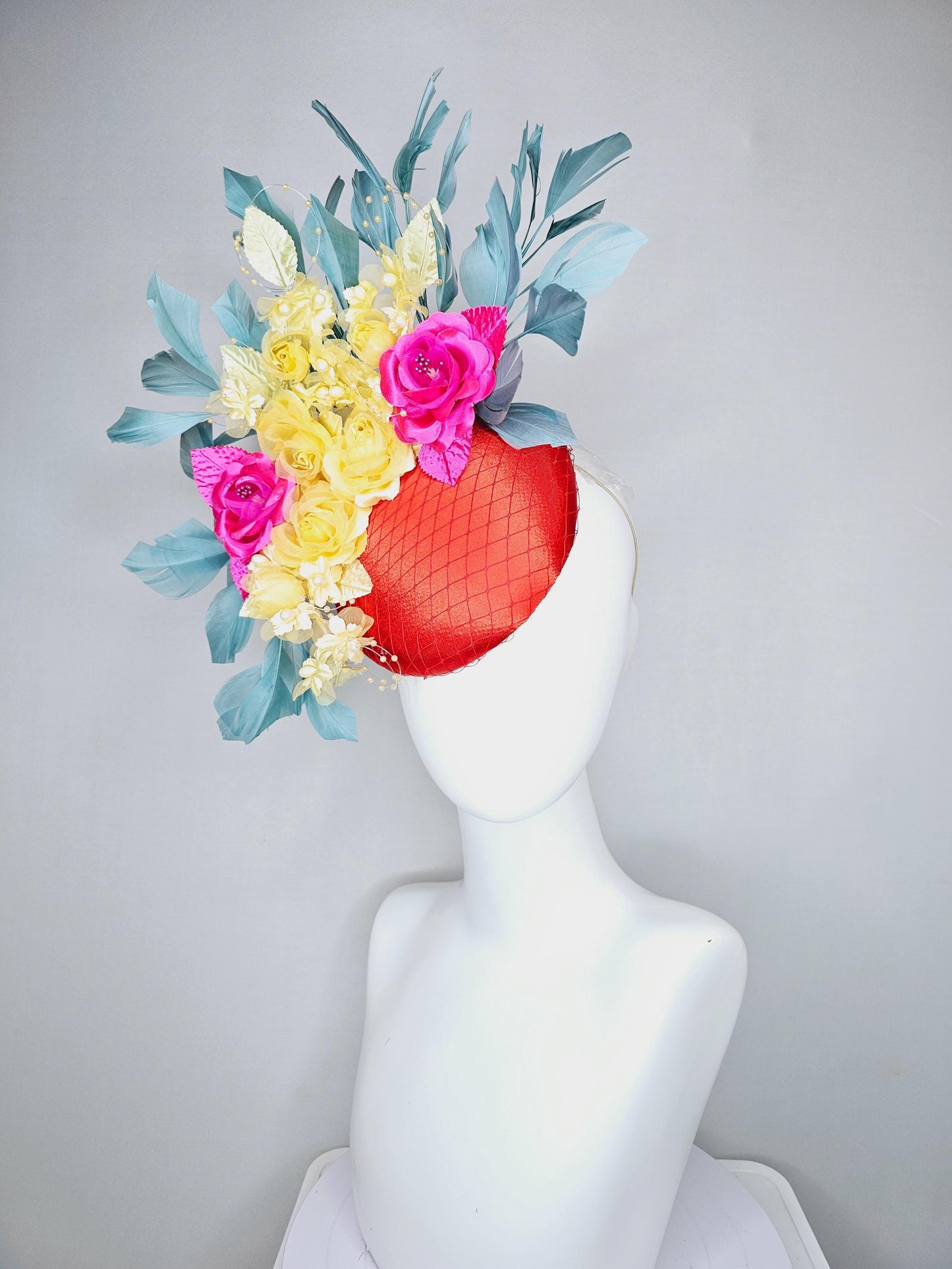 kentucky derby hat fascinator red satin with netting, pink yellow organza satin rose flowers,pink yellow leaves,teal blue branching feathers