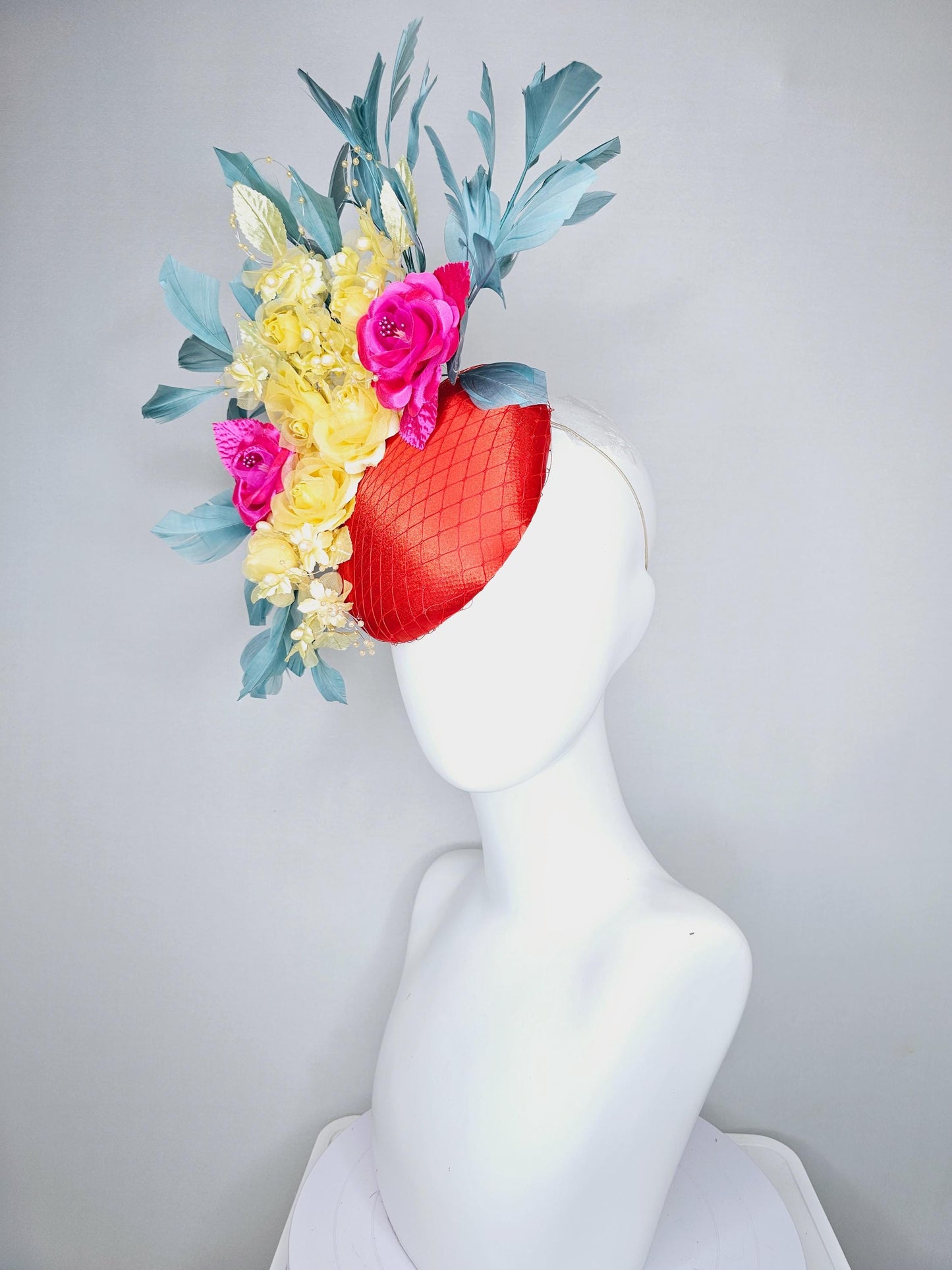 kentucky derby hat fascinator red satin with netting, pink yellow organza satin rose flowers,pink yellow leaves,teal blue branching feathers