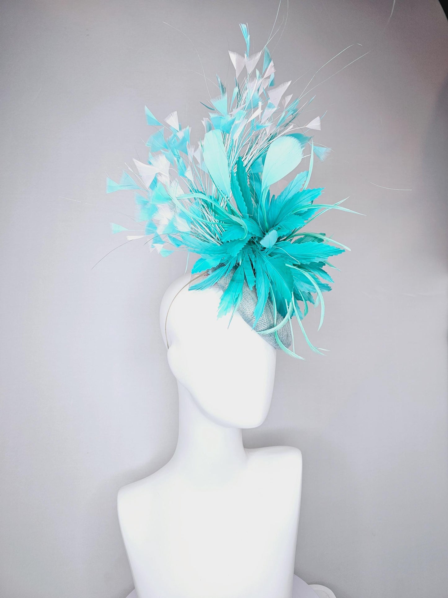 kentucky derby hat fascinator light blue sinamay, fluffy turquoise blue mint green zigzag feather flower, white blue branching feathers