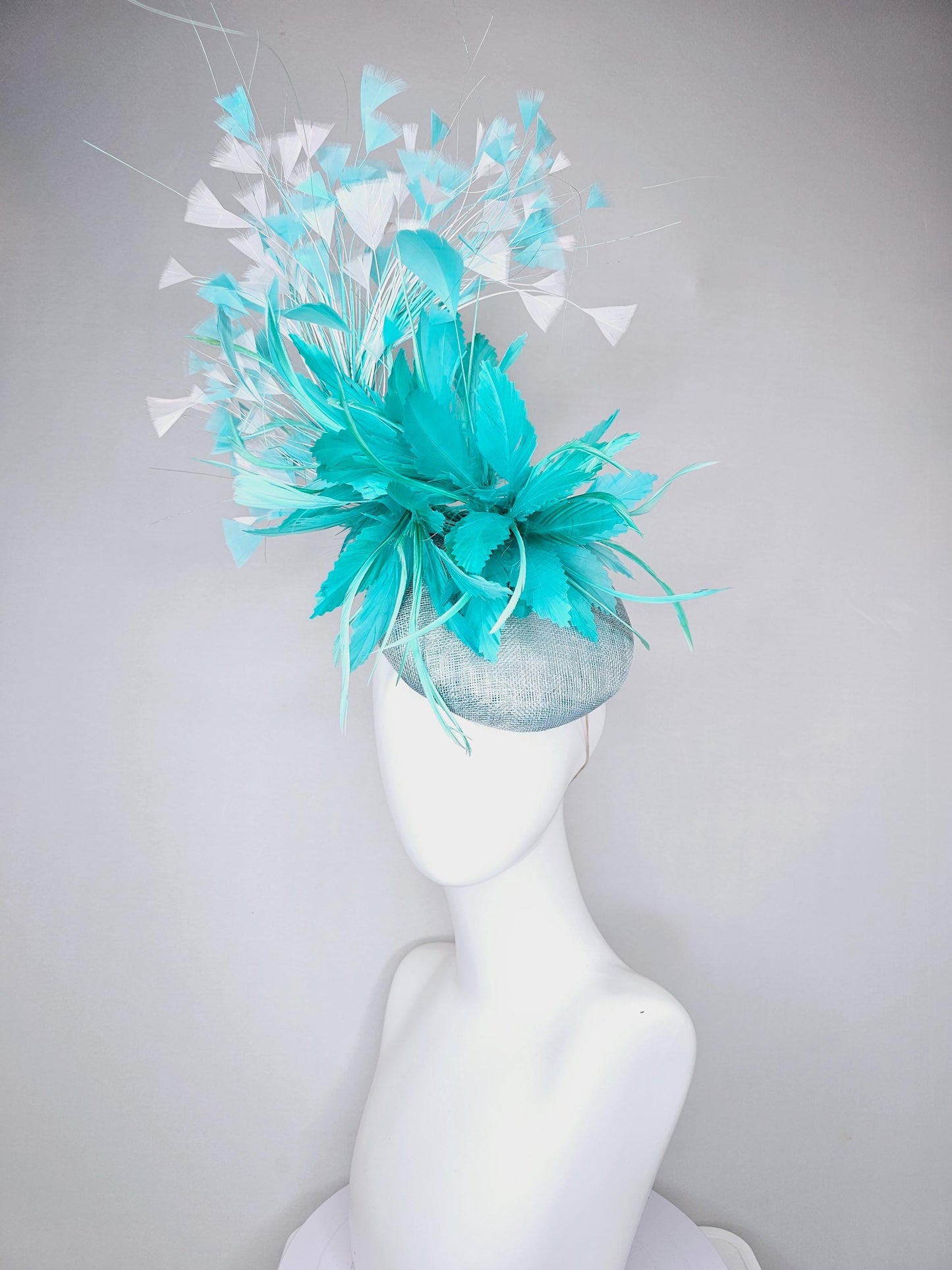 kentucky derby hat fascinator light blue sinamay, fluffy turquoise blue mint green zigzag feather flower, white blue branching feathers