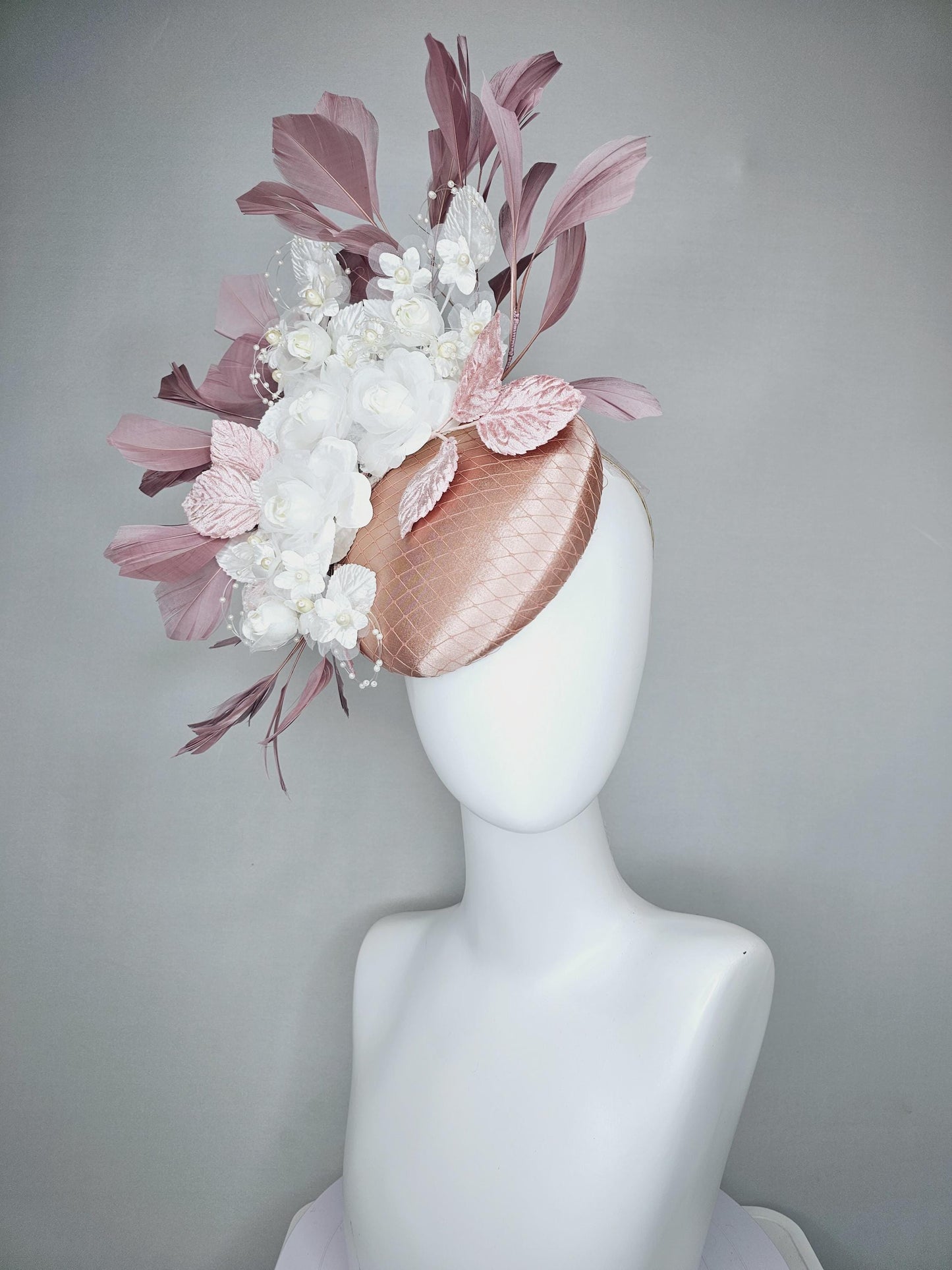 kentucky derby hat fascinator champagne pink satin with netting white organza satin flowers light pink leaves mauve taupe branching feathers